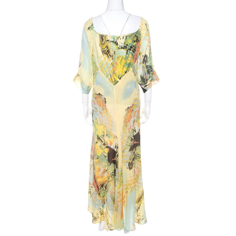 Lovely in yellow abstract print, this Roberto Cavalli dress is here to take your breath away and will make sure you stand out in the crowd! It features a draped neckline and comes equipped with a concealed zip closure. Pair it with strappy sandals