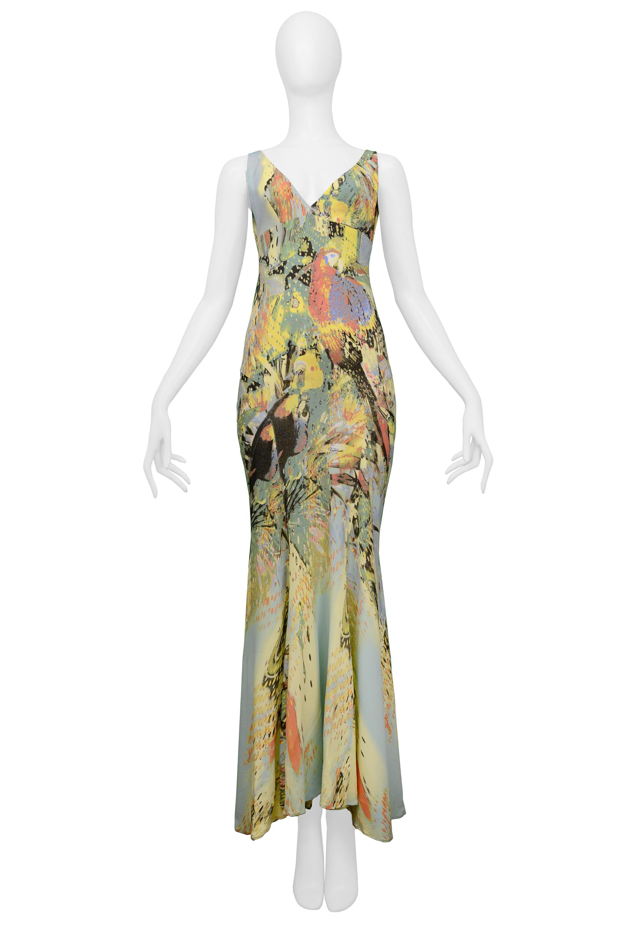 Resurrection Vintage is excited to present a vintage Roberto Cavalli yellow parrot print slip dress featuring thick straps, 1930's style slip dress bodice, decorative panels at the hips, three gold-tone hooks and eyes at center back that feature
