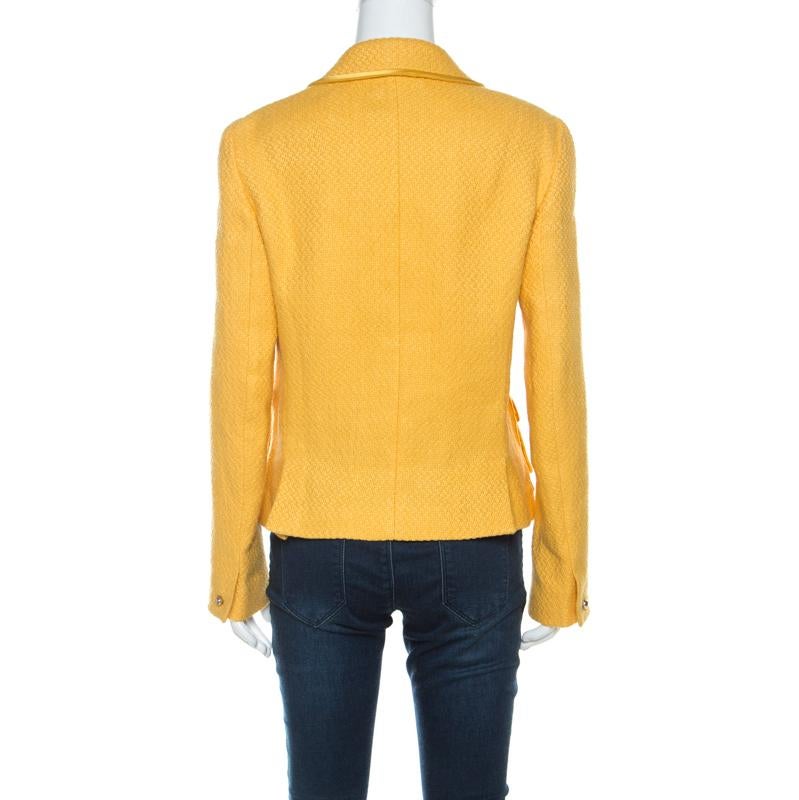 Gorgeous and comfortable, this blazer from Roberto Cavalli will make others nod in admiration. The fabulous yellow textured blazer is tailored from a linen blend, and it features front buttons, notched lapels and pockets.

