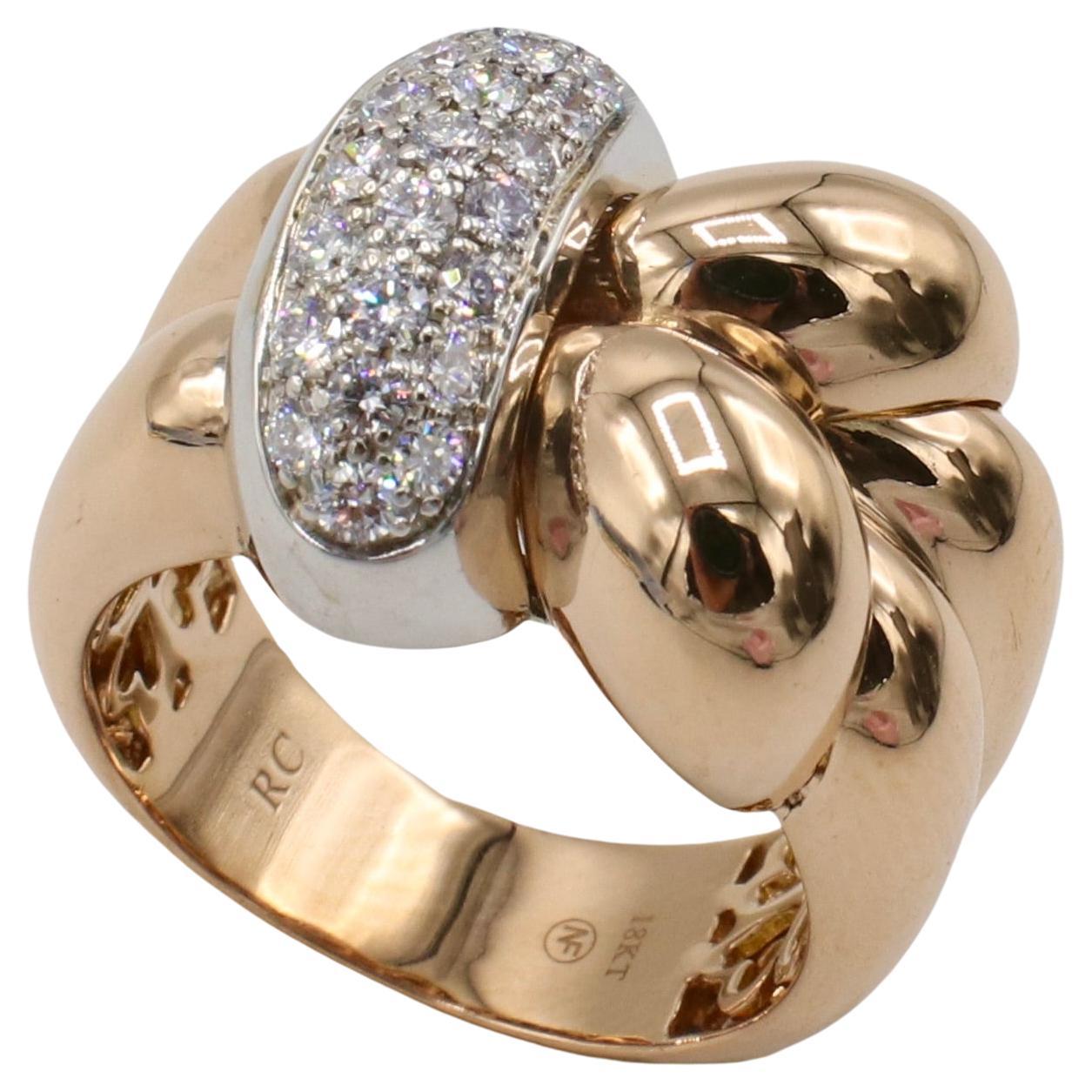 Roberto Coin 18 Karat Rose Gold Natural Diamond Twist Ring 
Metal: 10.23 grams
Diamonds: Approx.  0.45 CTW G-H VS natural round diamonds
Size: 6.5 (US)
Height: 7.2mm
Signed: 18KT RC signature ruby hallmark 
