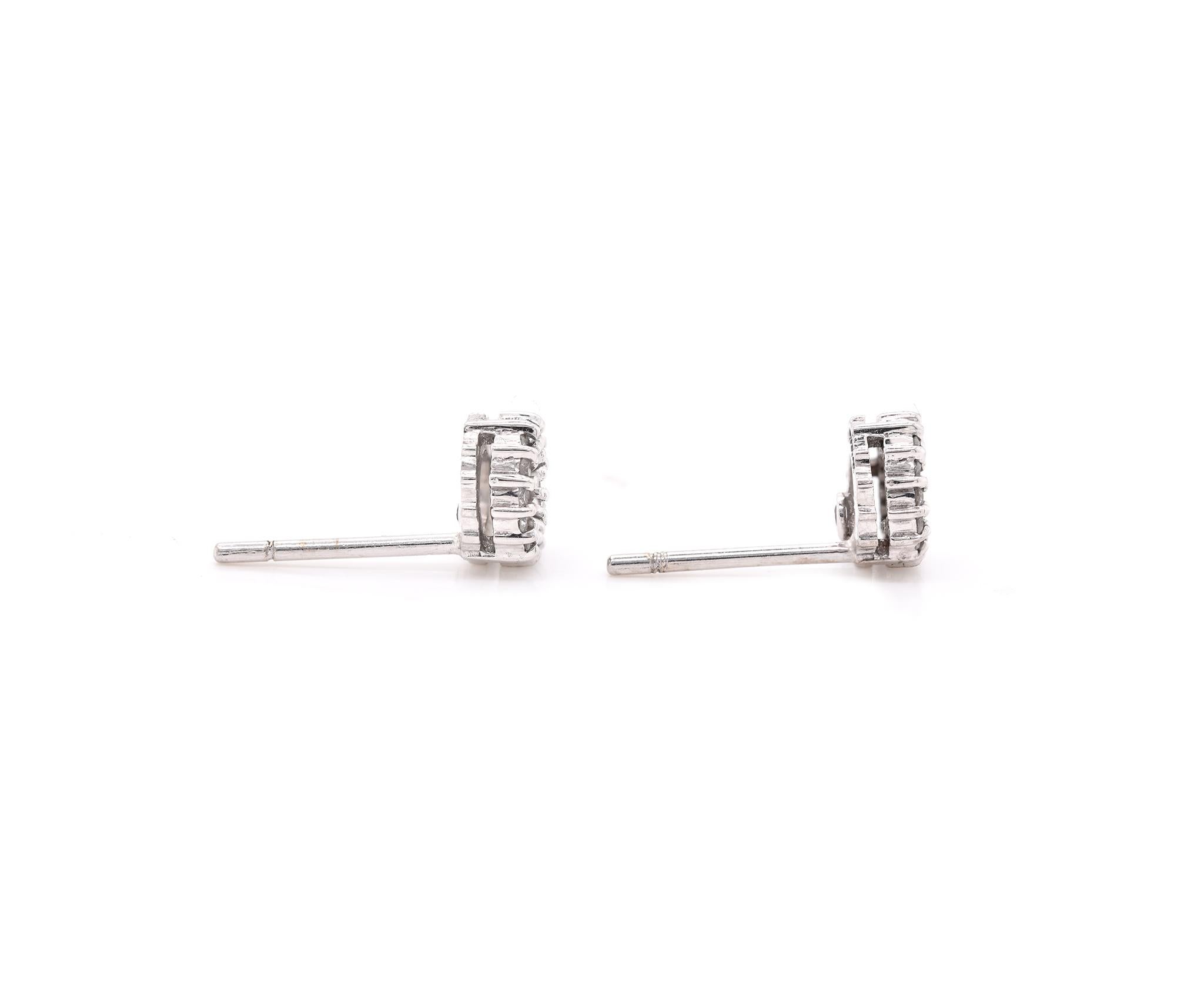 Designer: Roberto Coin 
Material: 18k white gold
Diamonds: 28 round brilliant cuts = .13cttw
Color: G
Clarity: VS2
Dimensions: earrings measure 6.6mm wide
Weight: 1.92 grams
