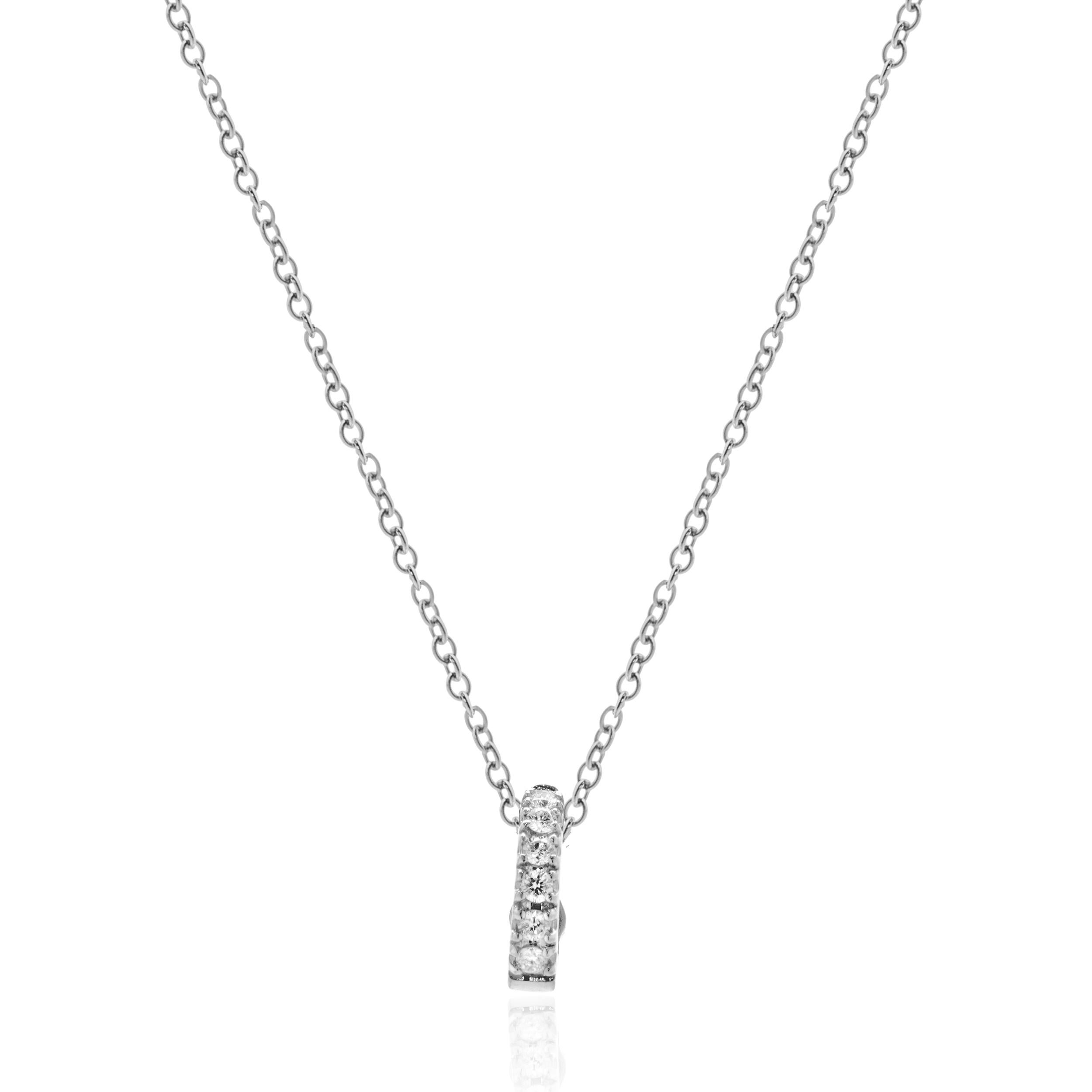 Designer: Roberto Coin
Material: 18K white gold
Diamonds: 7 round brilliant cut = 0.07cttw
Color: G
Clarity: VS1-2
Weight: 3.55
Dimensions: necklace measures 18-inches long
