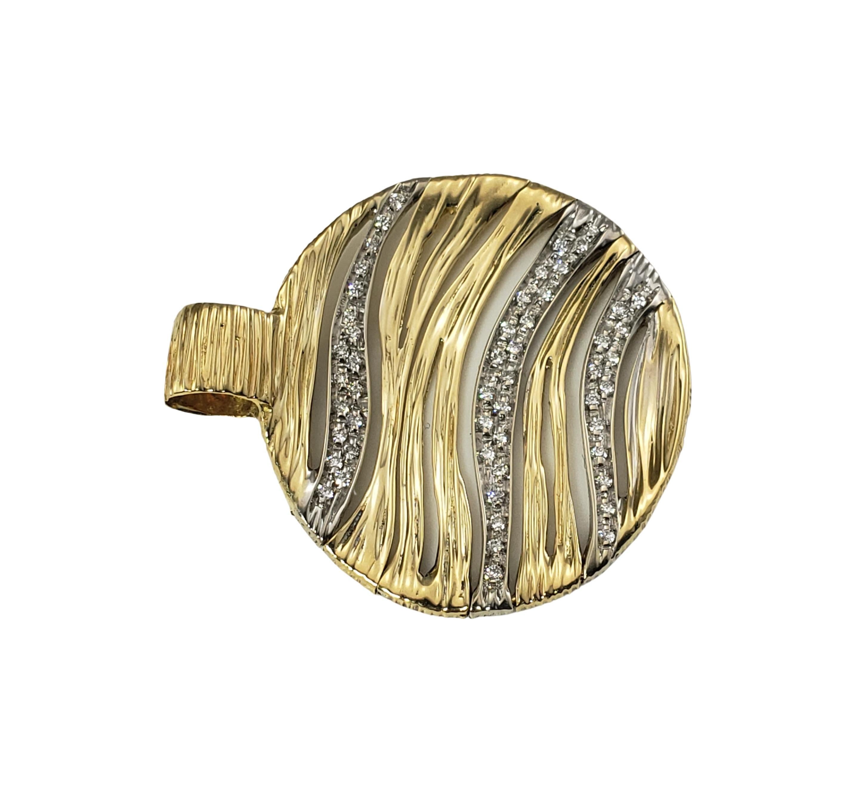 Roberto Coin 18 Karat Yellow and White Gold and Diamond Elfantino Pendant-

This stunning pendant by Roberto Coin features 52 round brilliant cut diamonds set in beautifully detailed 18K yellow and white gold.

Approximate total diamond weight:  .25