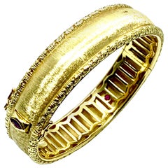Roberto Coin 18 Karat Yellow Gold Bangle Bracelet with a Ruby Clasp