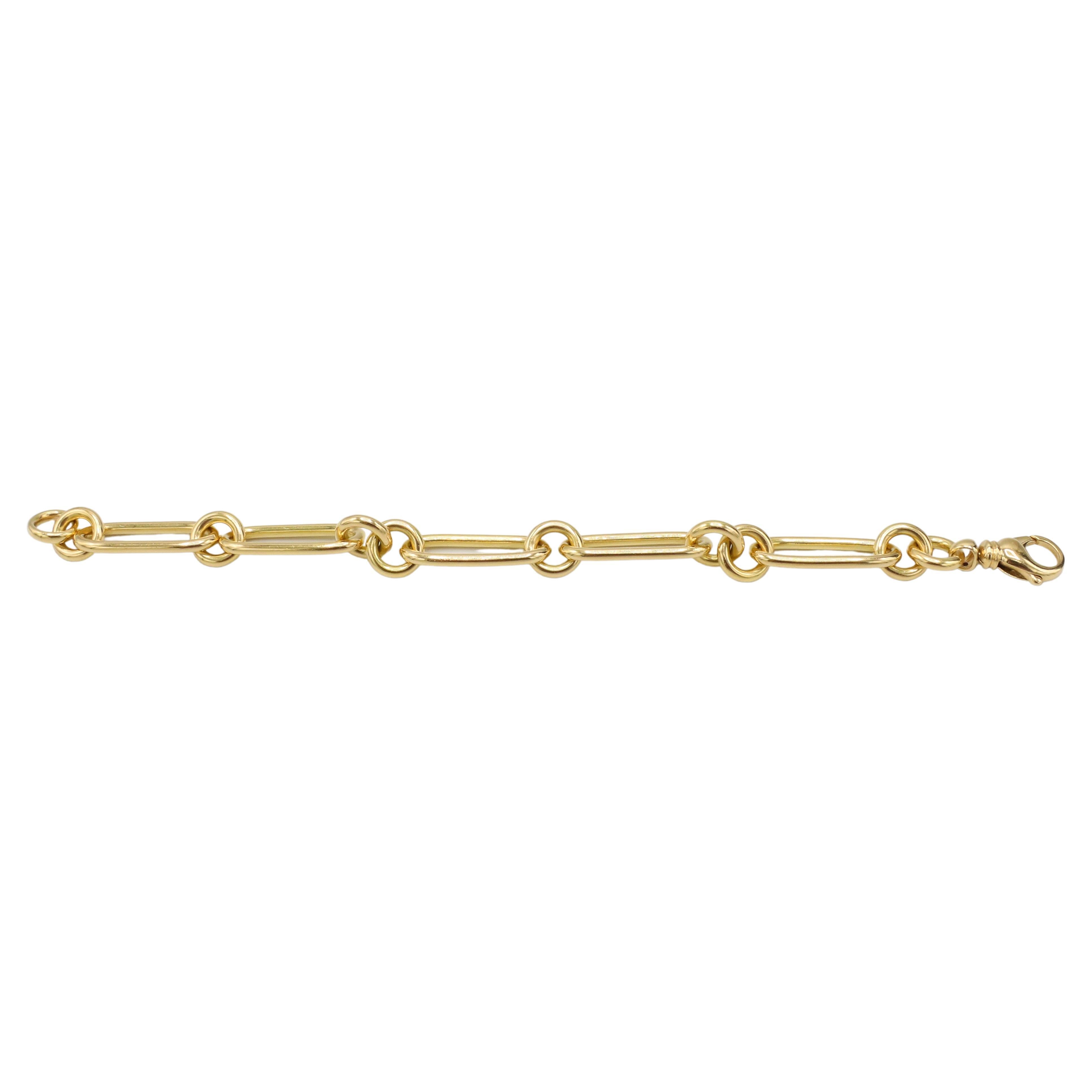 Roberto Coin 18 Karat Yellow Gold Designer Oval & Round Paperclip Link Bracelet 
Metal: 18k yellow gold
Weight: 17.74 grams
Length: 8 inches
Links: Oval links, 30mm, round links, 10mm
Signed: RC 18K Italy 
Retail: $5,100 USD

