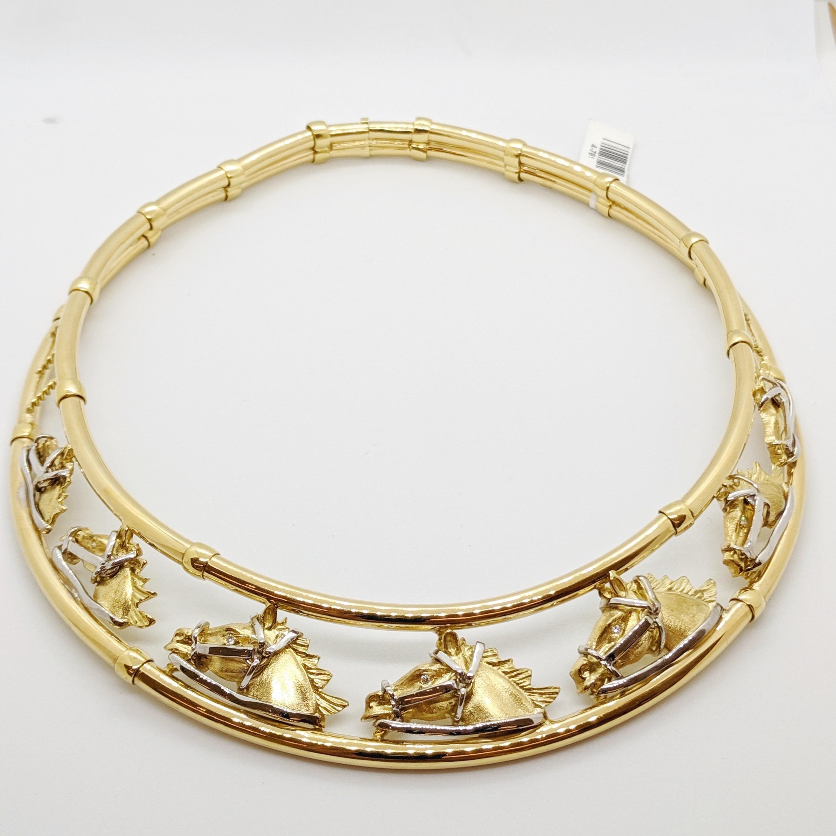 Known for his borderless and romantic imagination Roberto Coin jewelry tells a story through jewels that become works of art. This 18 karat yellow gold collar necklace is a perfect example of his art. Seven graduating horse heads float between two
