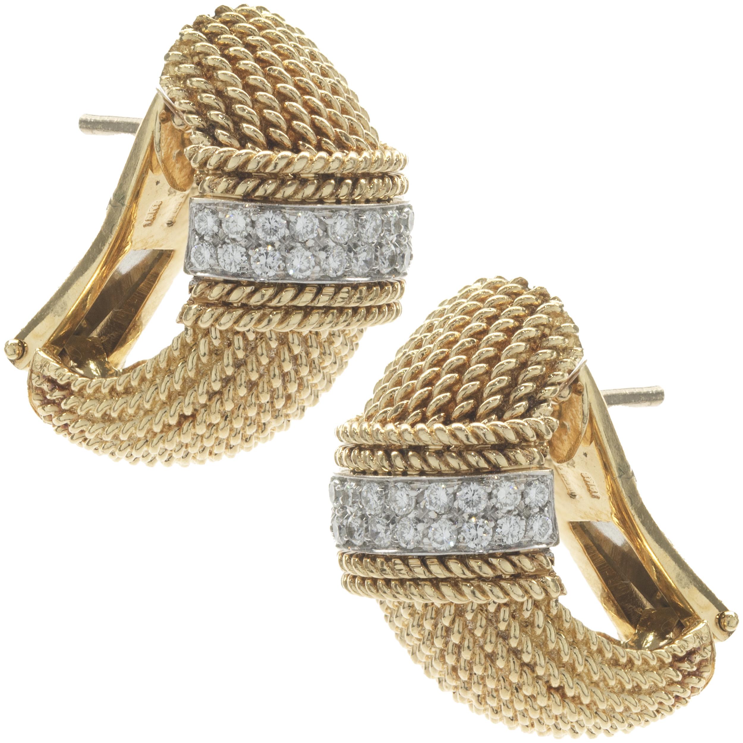 Designer: Roberto Coin
Material: 18K yellow gold
Diamond: 44 round brilliant cut = 1.00cttw
Color: G
Clarity: VS2
Weight: 18.66 grams
Dimensions: earrings top measures 12.75mm wide