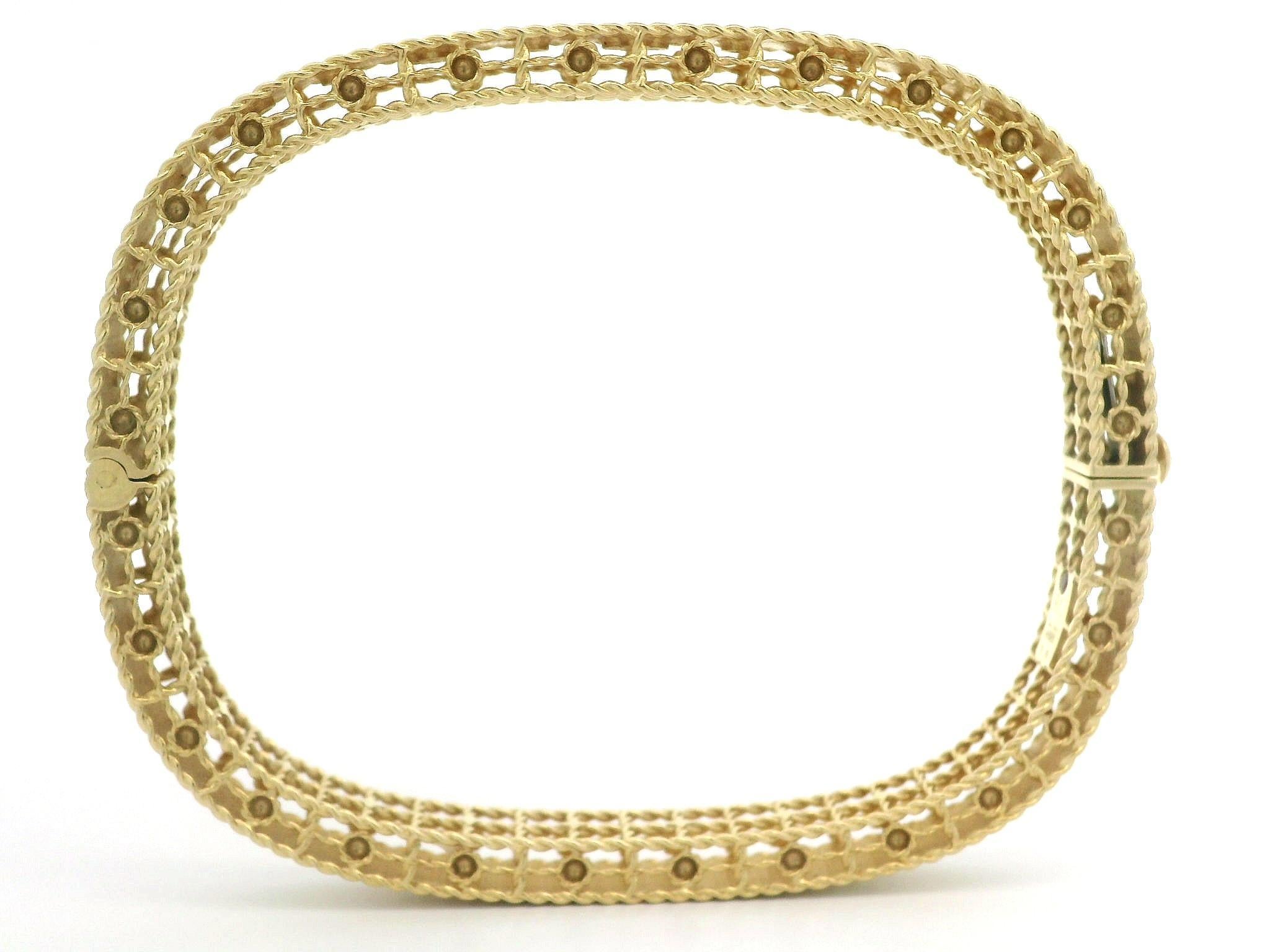 –Stone(s)–
(36) Natural Genuine Diamonds - Round Brilliant Cut - Pave Set - White Color 
Total Carat Weight: 0.48ctw (approx.)

Material: 18k Yellow Gold 
Weight: 18 Grams
Size: 6.5