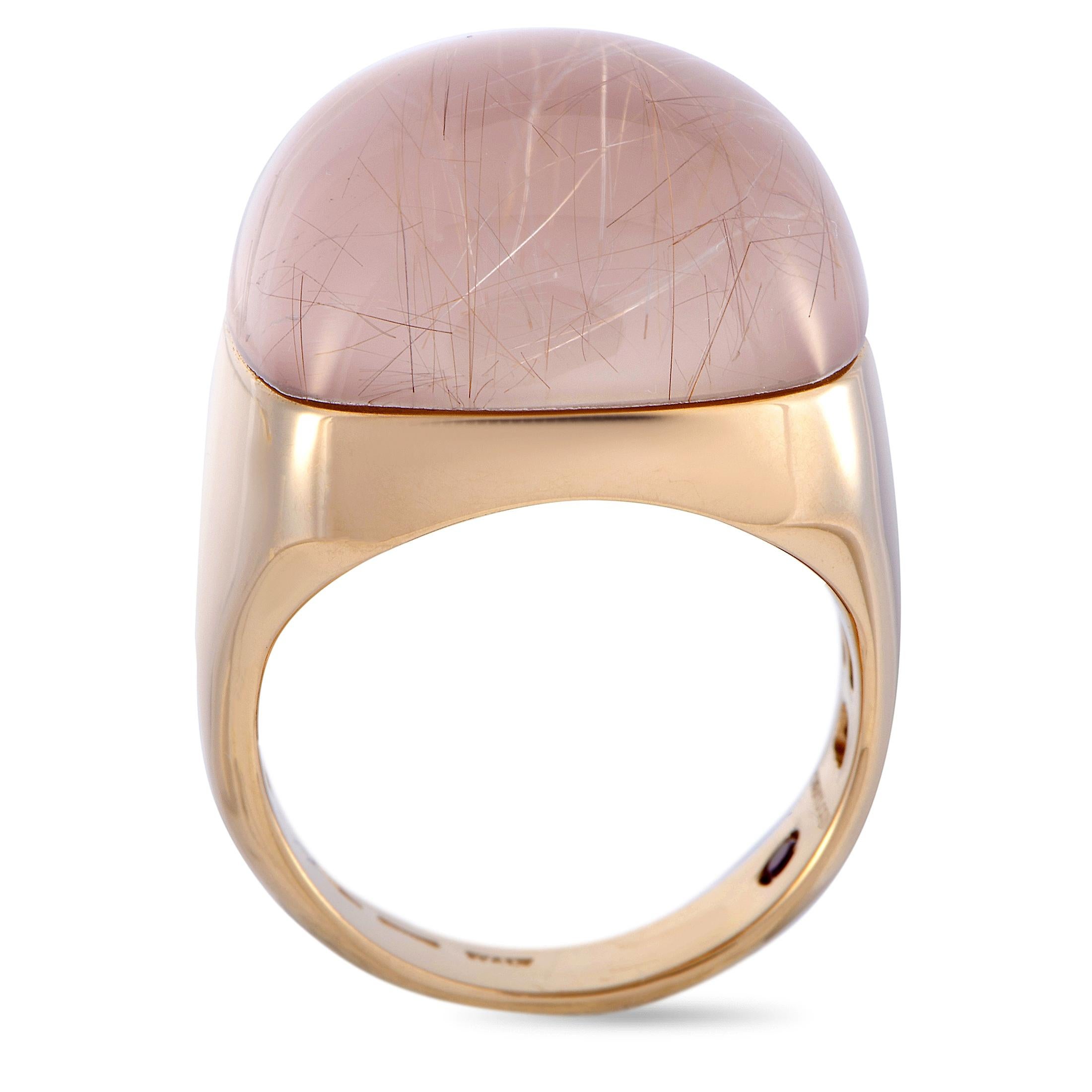 This Roberto Coin ring is crafted from 18K rose gold and set with a rutilated quartz. The ring weighs 13.6 grams, boasting band thickness of 4 mm and top height of 10 mm, while top dimensions measure 20 by 20 mm.
Ring Size: 6.5
Offered in brand new