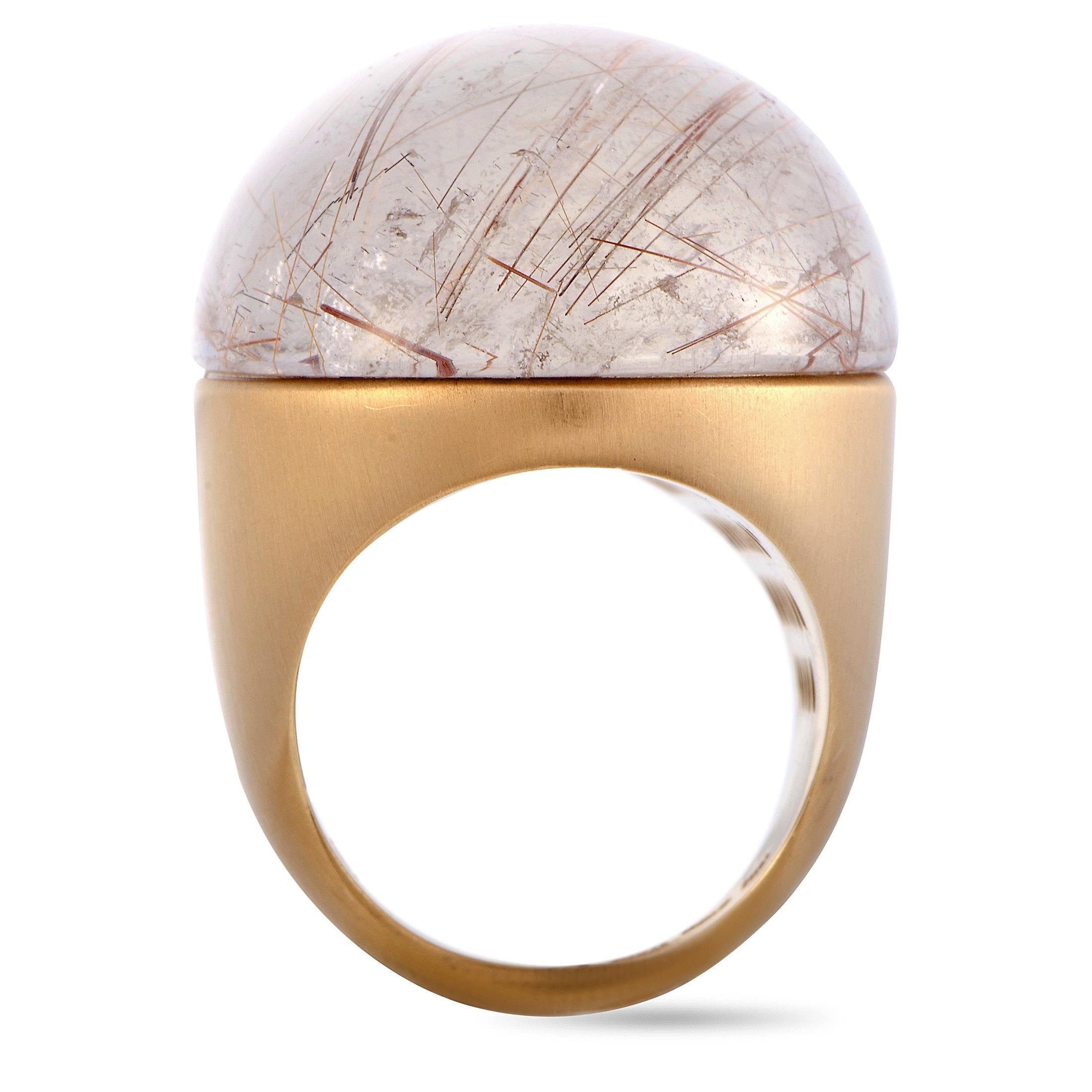 This Roberto Coin ring is crafted from 18K rose gold and set with a rutilated quartz. The ring weighs 32.2 grams, boasting band thickness of 5 mm and top height of 14 mm, while top dimensions measure 32 by 25 mm.

Ring Size: 6.25

Offered in brand