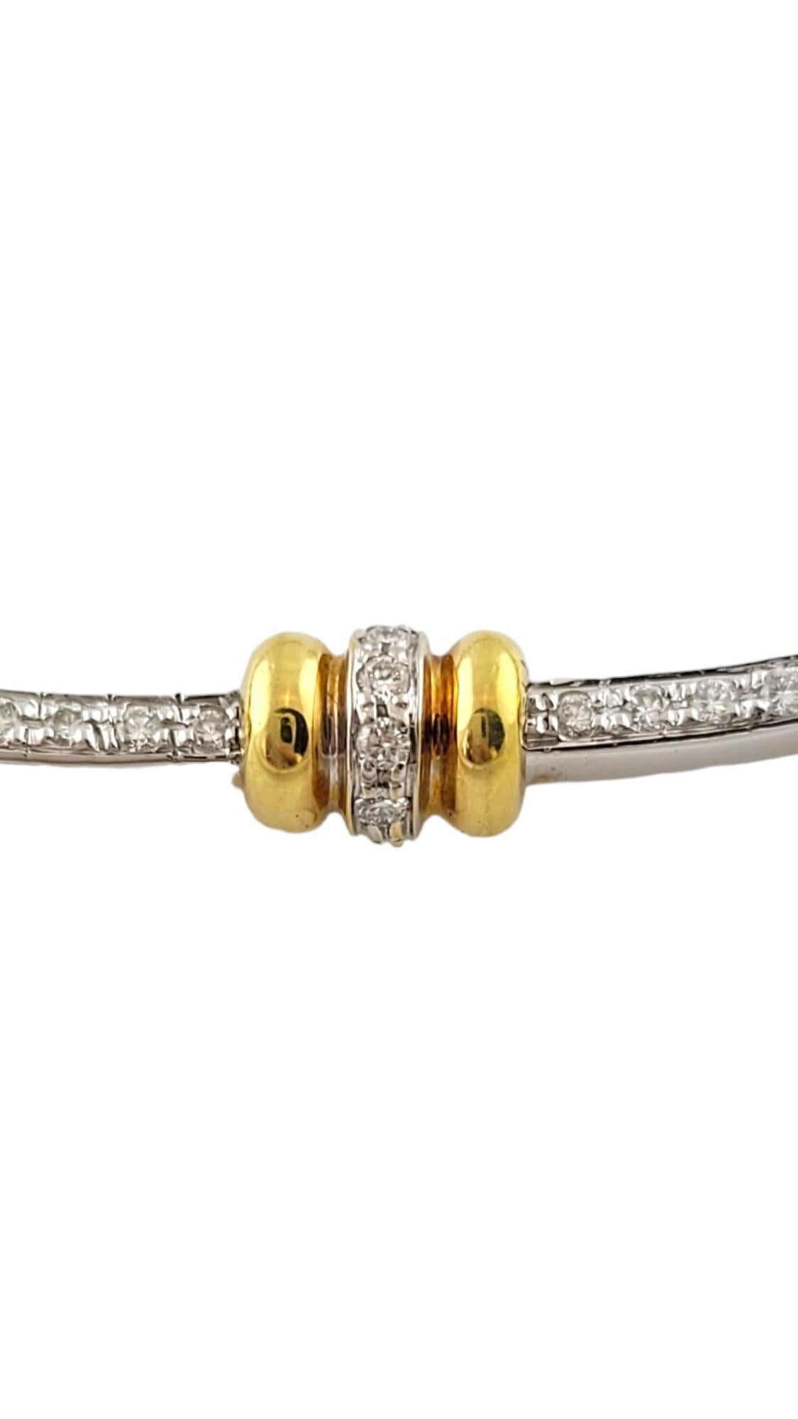 Roberto Coin 18K Yellow and White Gold Diamond Choker Collar Necklace

This classic Roberto Coin choker is set in 18K yellow and white gold

Center of the necklace is set with 75 round brilliant diamonds.

Diamonds are approx. .75cts and of VS1