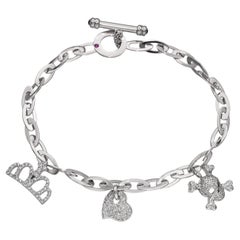 Pulseras con dijes de oro