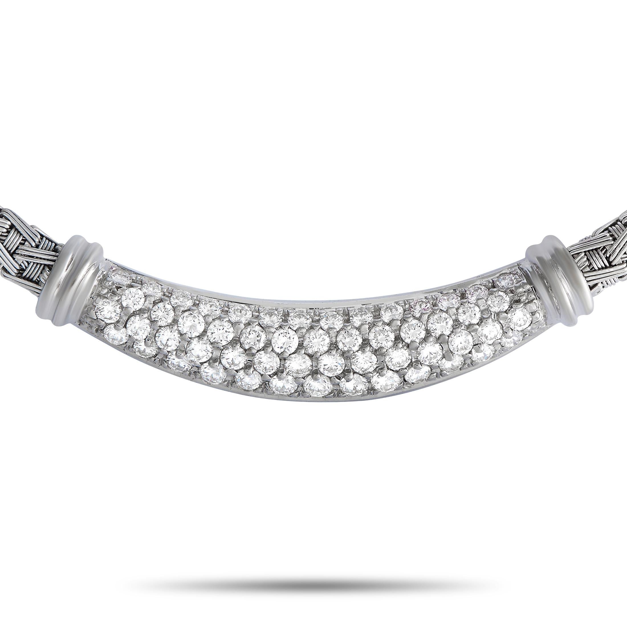 This Roberto Coin necklace beautifully reflects Italian romance and contemporary elegance. It features a woven-designed necklace measuring 15 inches long. Serving as its focal point is a white gold tubular 