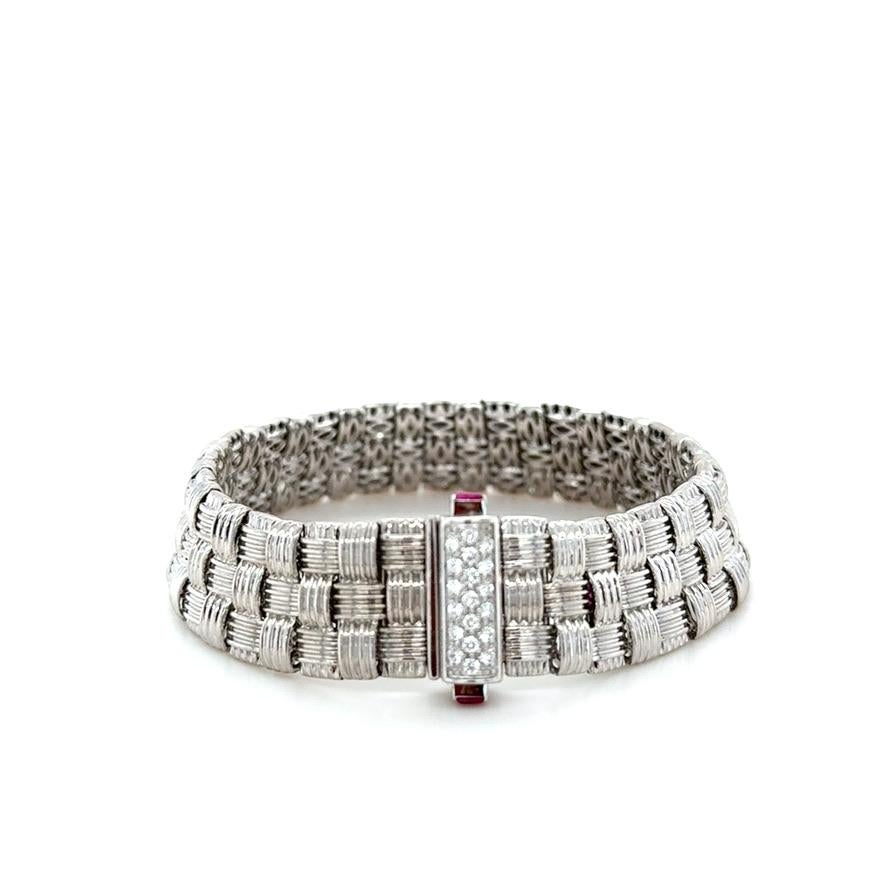 This classic bracelet designed by Roberto Coin in there Appassionata Collection, features a basket weave design with diamond set clasp weighing approximately 0.30 carat total. Skillfully crafted, this bracelet is comfortable and perfect for everyday