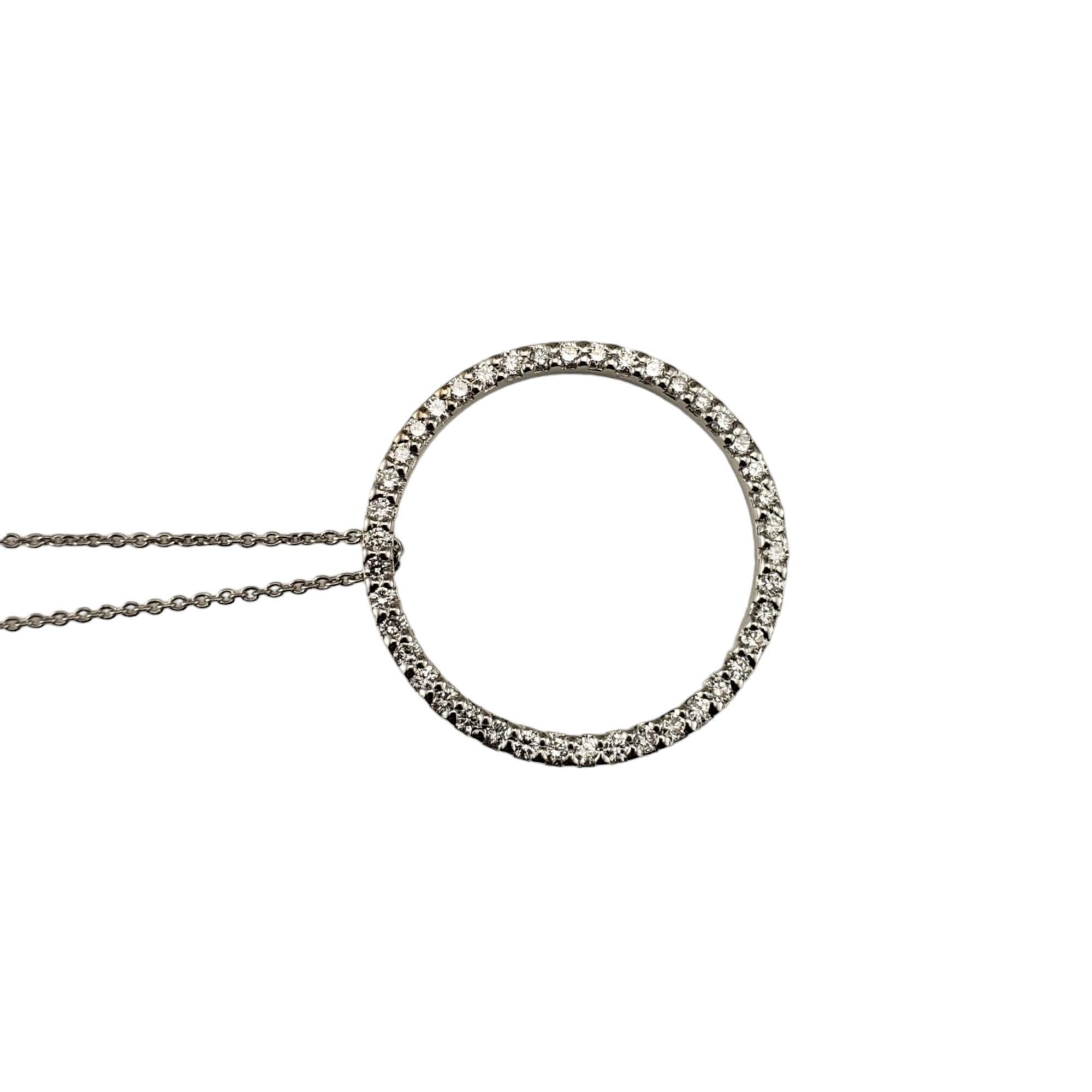 Roberto Coin 18K White Gold and Diamond Circle of Life Pendant Necklace-

This sparkling pendant necklace by Roberto Coin features 44 round brilliant cut diamonds set in 18K white gold. 

Approximate total diamond weight: .44 ct.

Diamond color: