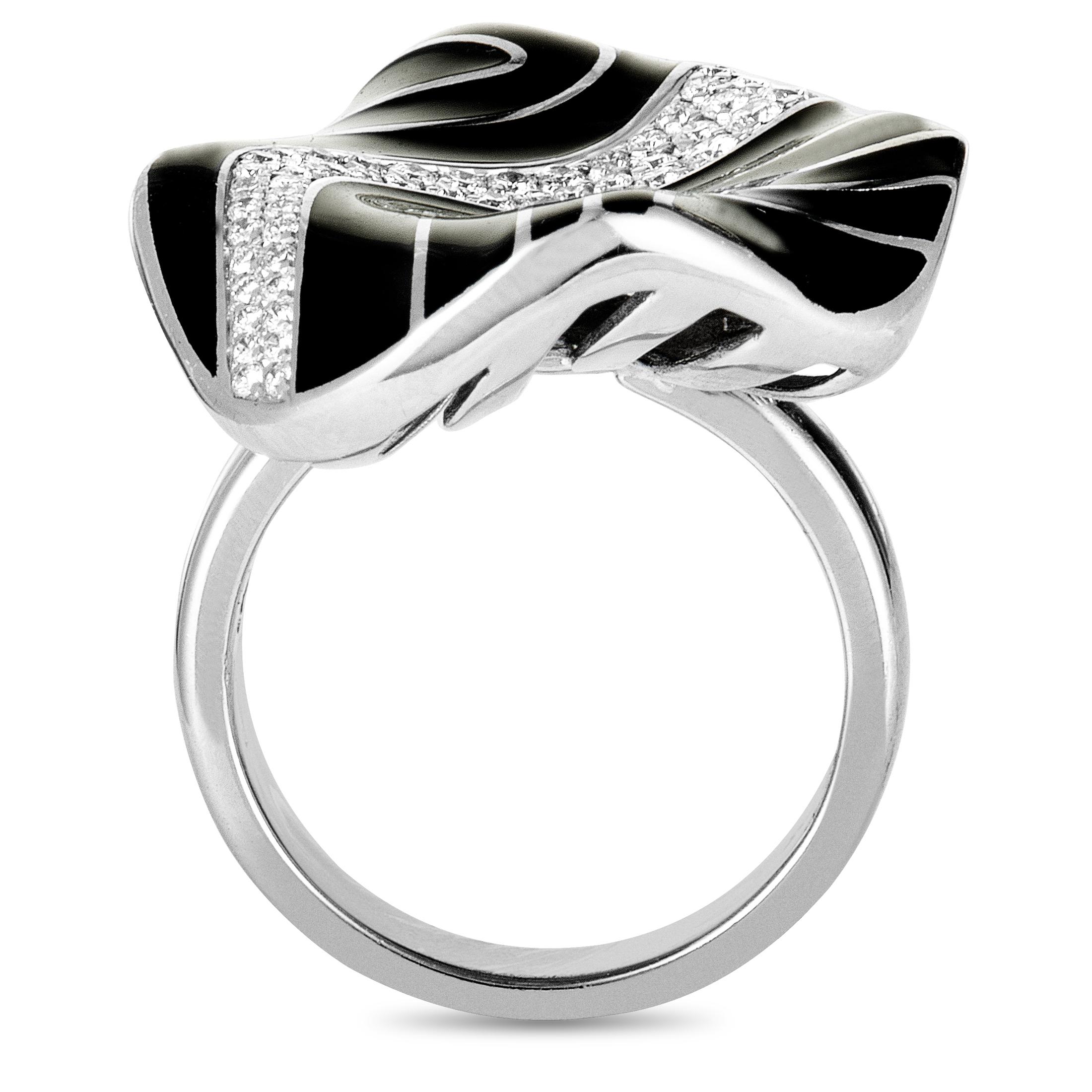 This fantastic Roberto Coin ring is beautifully crafted from elegant 18K white gold and embellished with lustrous white diamonds and striking black enamel, offering an incredibly eye-catching appearance. The diamonds weigh 0.56 carats in total.
