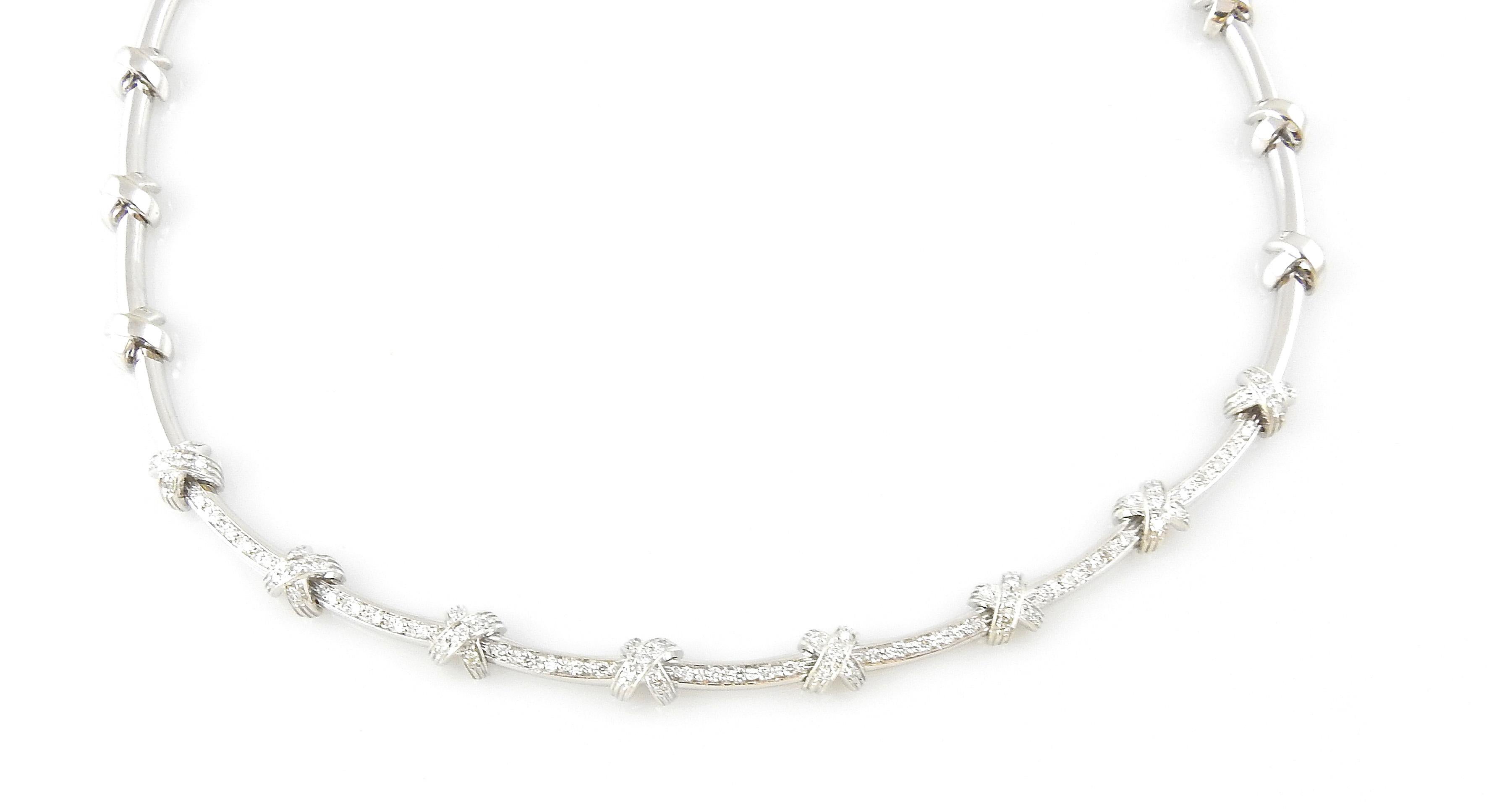 Roberto Coin 18K White Gold Diamond X Choker

This gorgeous Roberto Coin classic diamond x choker is set in white gold

75 round brilliant diamonds sparkle on and between 8 x stations

Diamond clarity:  VS1
Diamond Color: G
Total Diamond Weight: