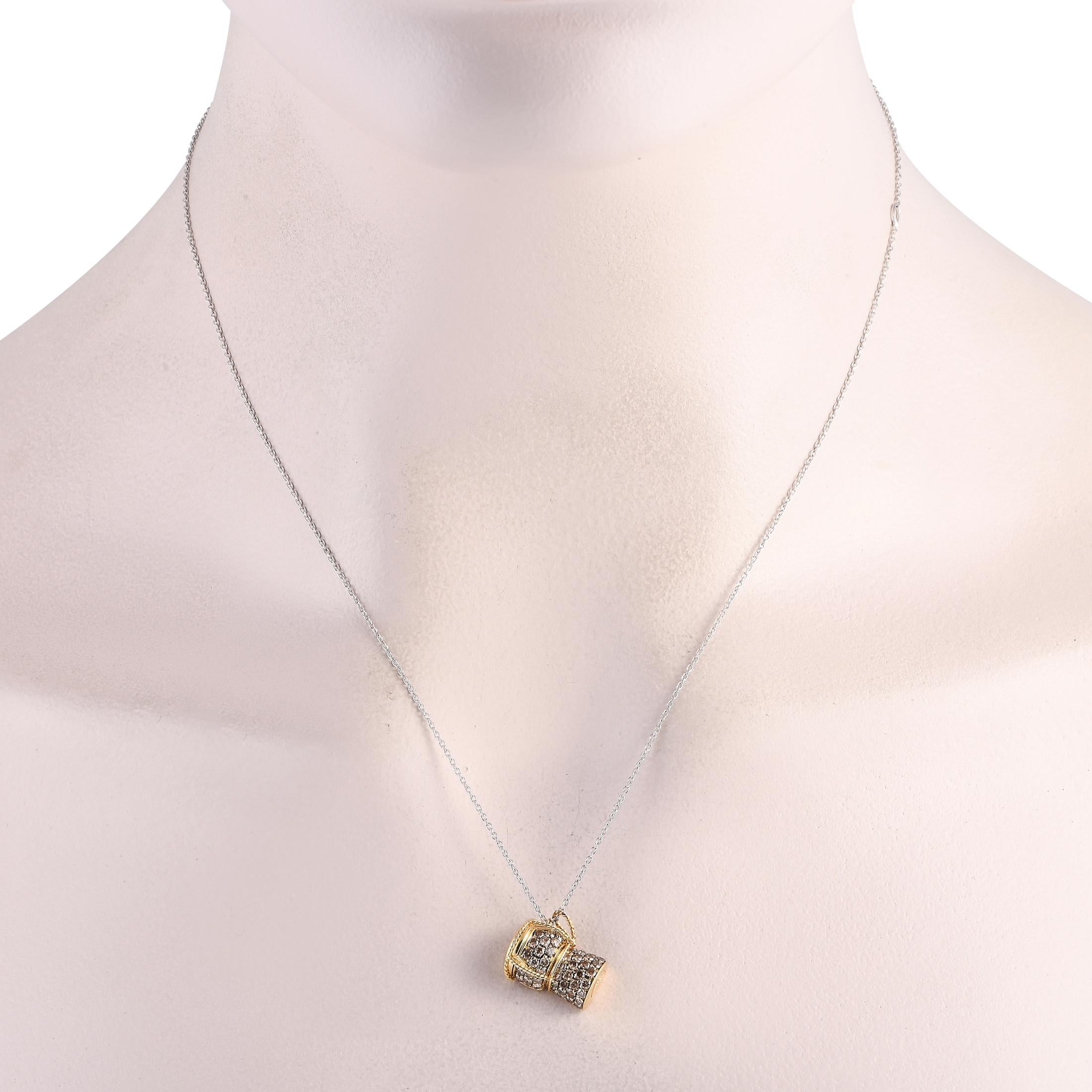 This charming Roberto Coin pendant necklace is ideal for any special occasion. An 18K Yellow Gold pendant shaped like a classic champagne cork comes to life thanks to diamonds totaling 0.80 carats. The pendant measures 0.65” long, 0.50” wide, and