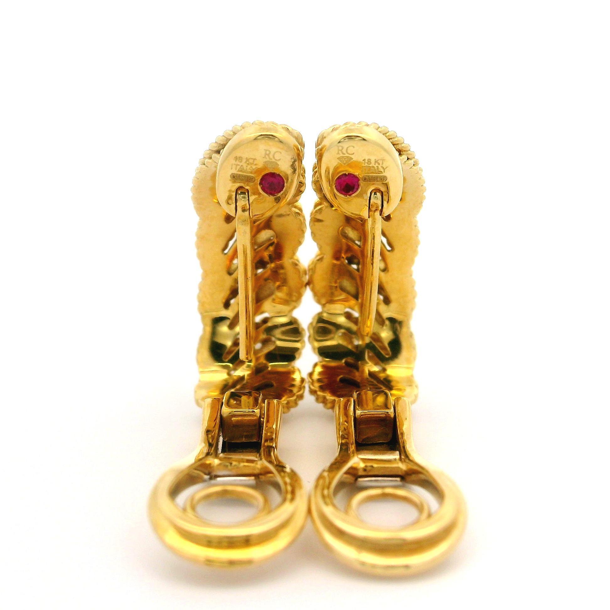 –Stone(s)–
(42) Natural Genuine Diamonds - Round Brilliant Cut - Pave Set - F/G Color - VS1/VS2 Clarity - 0.35ctw (approx.)

Material: 18k Yellow Gold 
Weight: 11.32 Grams
Backing: Swivel Posts with Omega/ Clip On Closures (Pierced ears are NOT