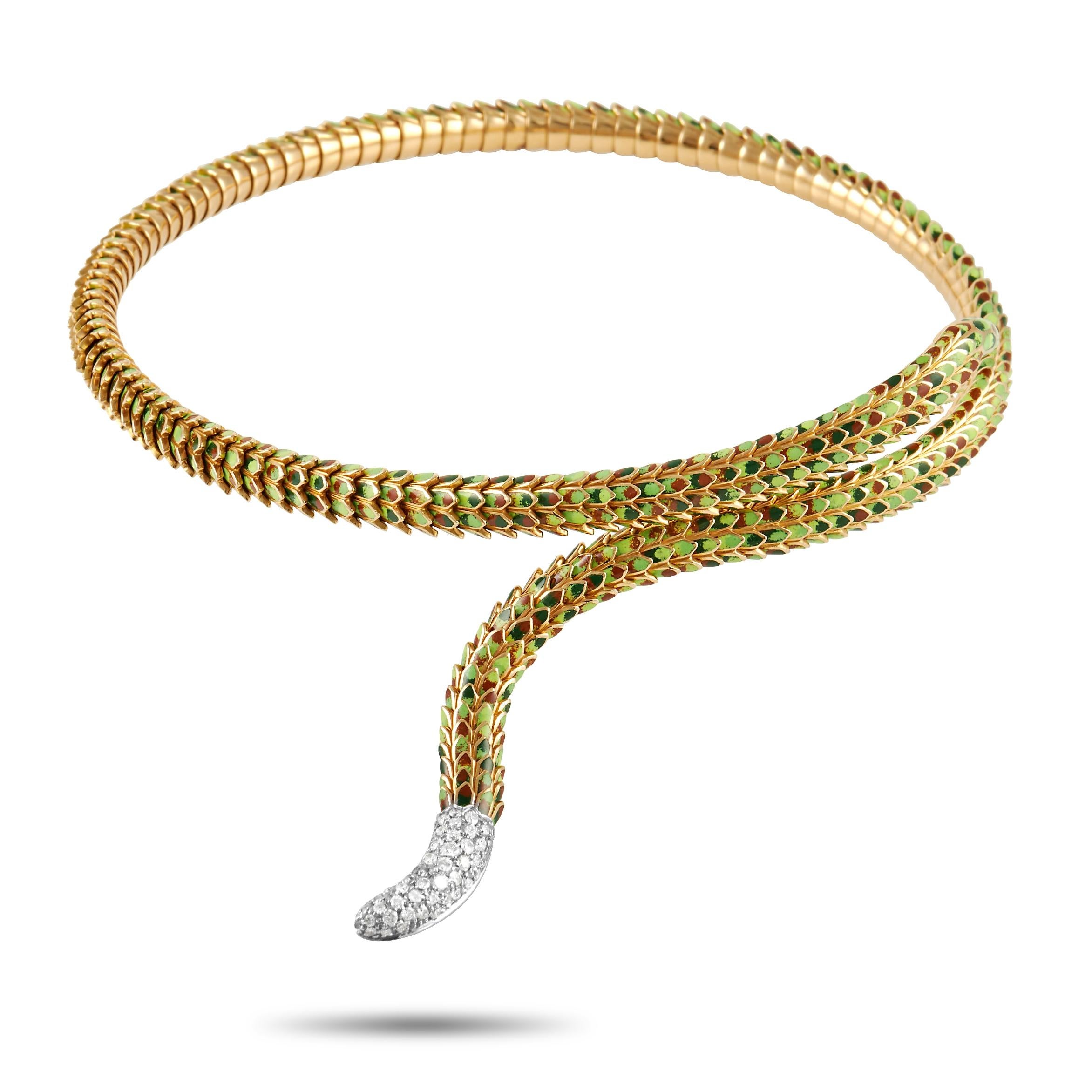 This Roberto Coin necklace is a veritable work of art. Crafted from 18K Yellow Gold, green enamel scales add lifelike elegance to this luxurious piece of jewelry. The tail is also covered in glittering pavé diamond gemstones with a total weight of
