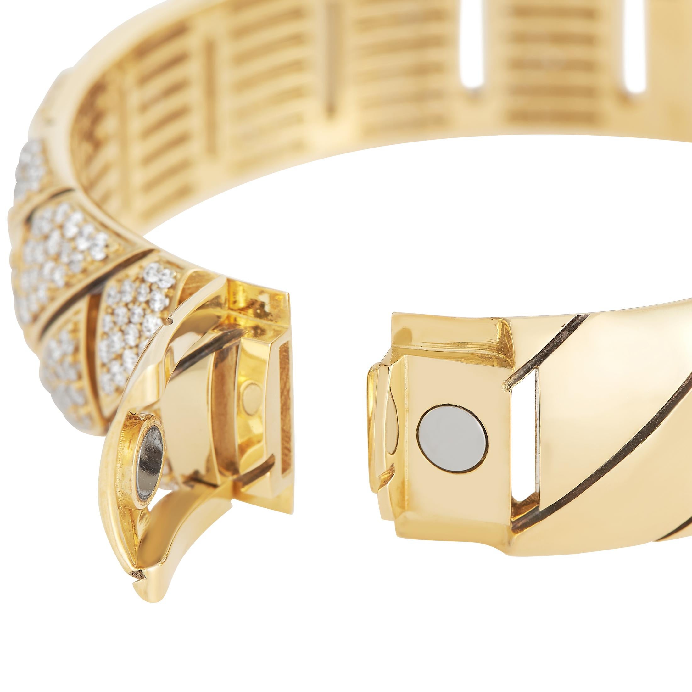 gold bangle with diamonds inset