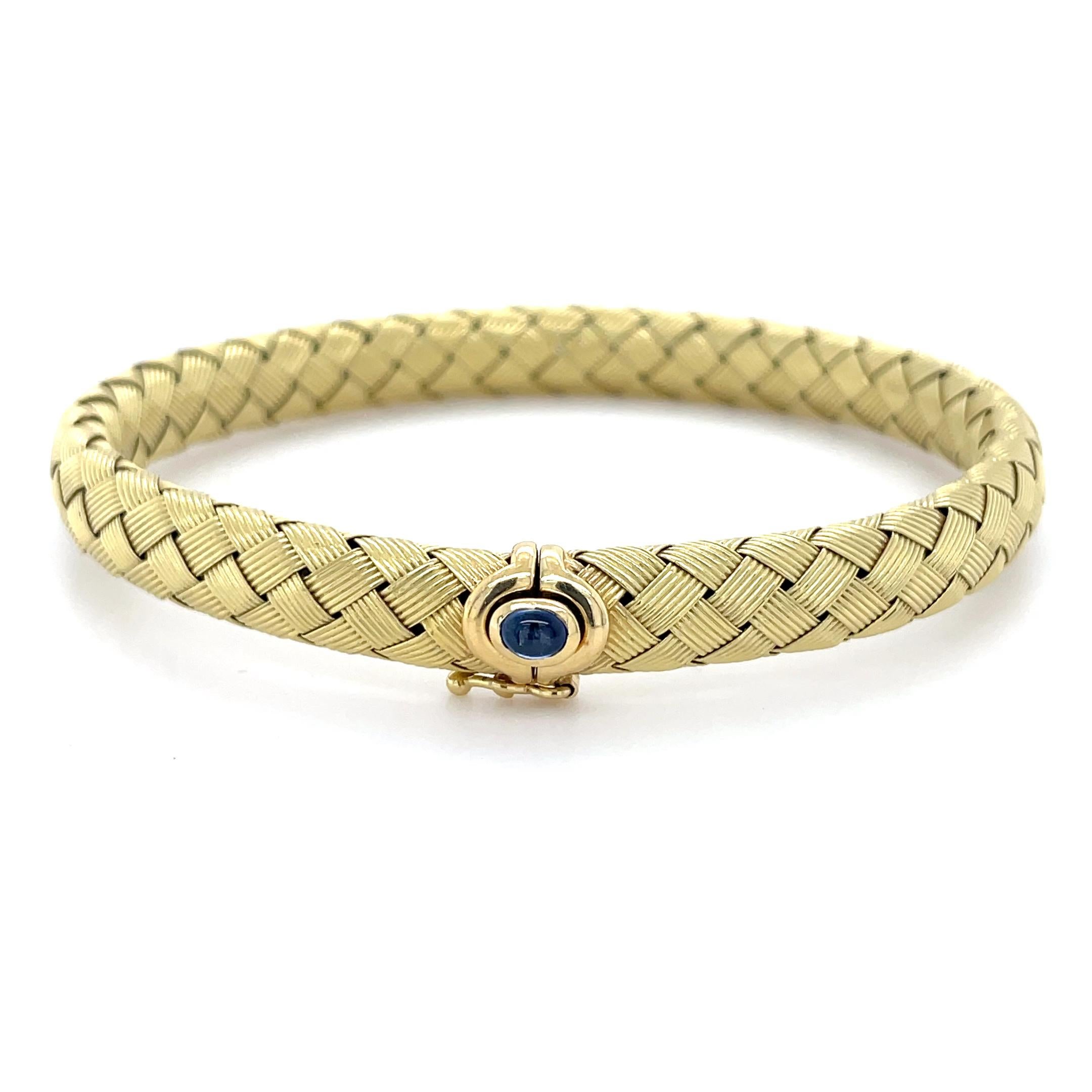 This classic bracelet designed by Roberto Coin, features a basket weave design with oval cabochon bezel set clasp. Skillfully crafted, this bracelet is comfortable and perfect for everyday wear!

Measurements: 7 inches inner circumference
Metal: 18