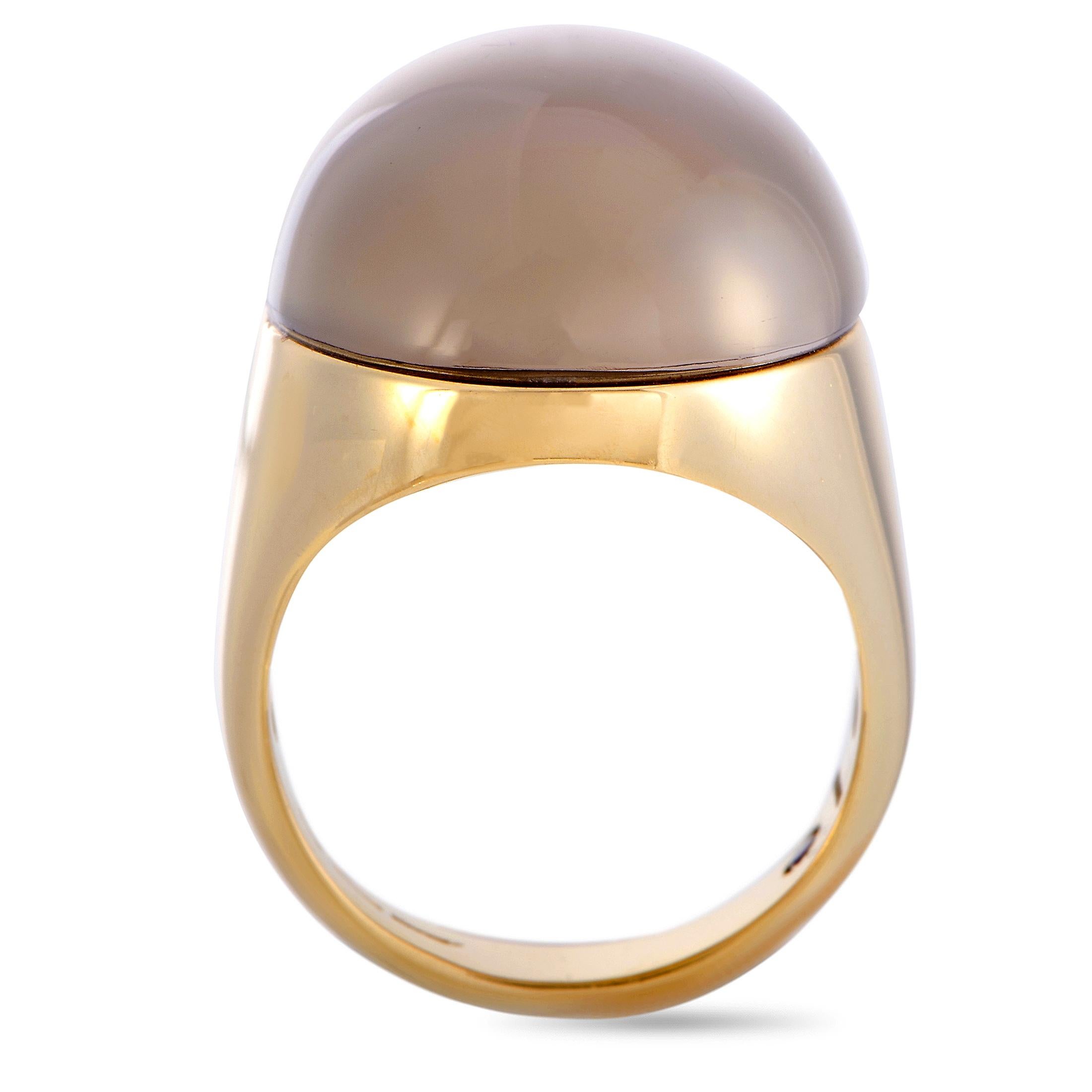 This Roberto Coin ring is crafted from 18K yellow gold and set with a smoky quartz. The ring weighs 14.6 grams, boasting band thickness of 4 mm and top height of 8 mm, while top dimensions measure 24 by 18 mm.

Ring Size: 6.5

Offered in brand new