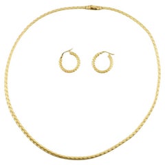 Roberto Coin Conjunto de collar y pendientes trenzados de oro amarillo de 18 quilates 29,65 g Italia 1220V