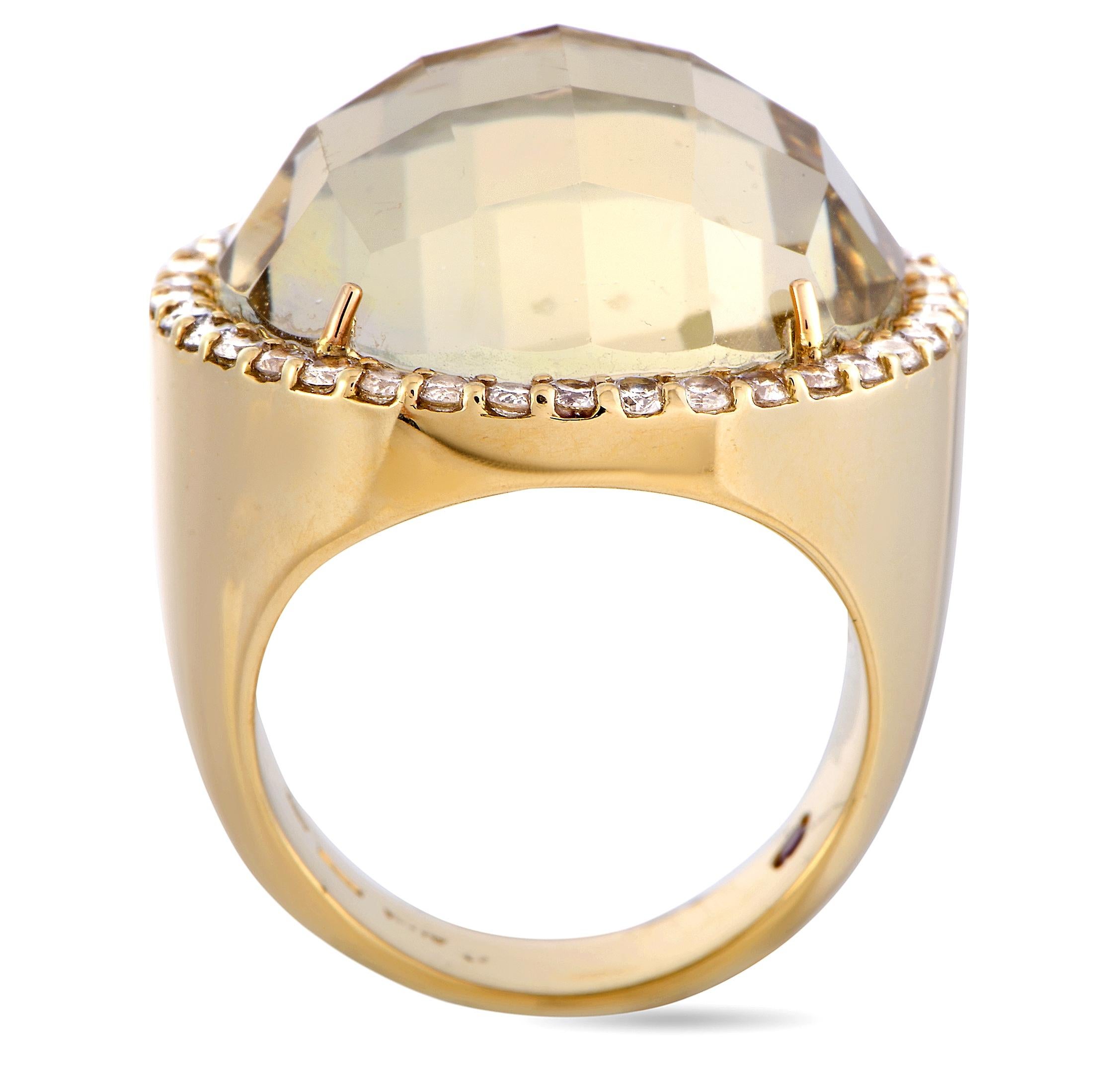 This Roberto Coin ring is crafted from 18K yellow gold and set with a 23.00 ct rutilated quartz and a total of 0.95 carats of diamonds. The ring weighs 22.5 grams, boasting band thickness of 4 mm and top height of 11 mm, while top dimensions measure