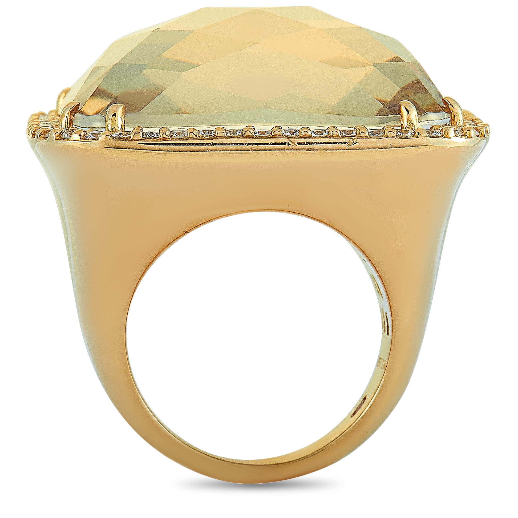 This Roberto Coin ring is crafted from 18K yellow gold and set with a smoky quartz and a total of 1.25 carats of diamonds. The ring weighs 35 grams, boasting band thickness of 4 mm and top height of 14 mm, while top dimensions measure 30 by 30