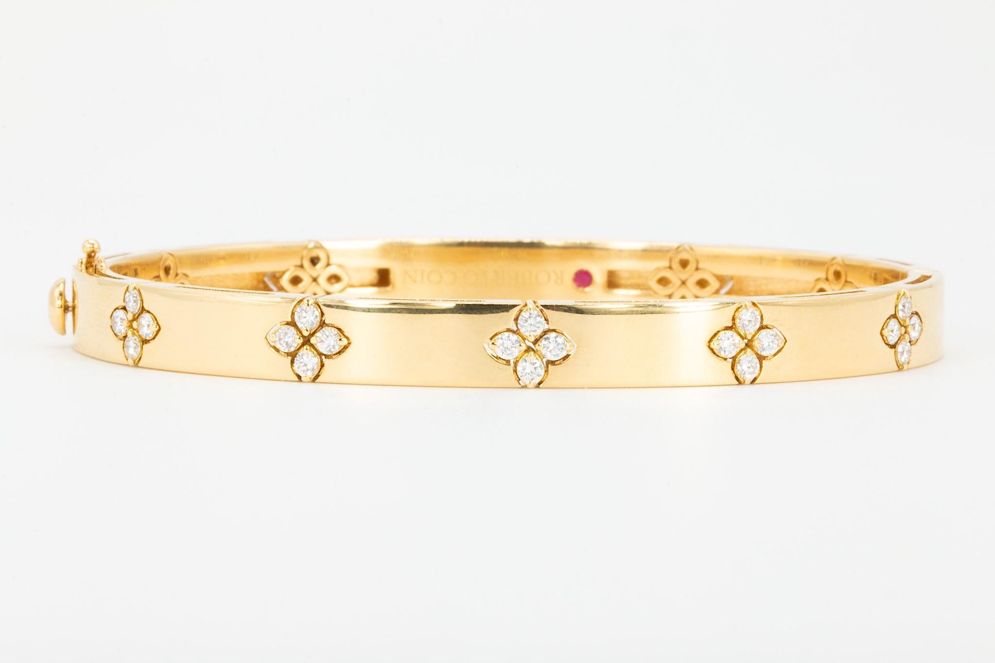 Roberto Coin 18k Yellow Gold Love in Verona Diamond Accent Bangle

This Roberto Coin Love in Verona diamond accent bangle captures the essence of refined Italian elegance. Expertly crafted in luminous 18K yellow gold, the design features the