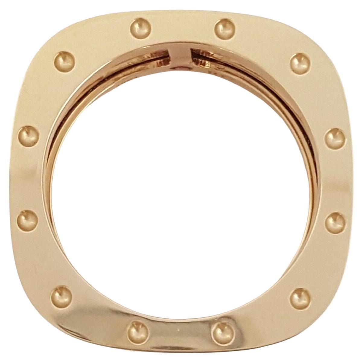 Roberto Coin 18K Yellow Gold Pois Moi Double Row Statement Ring / Band.



The ring weighs 11.4 grams, with measurement of 10.8mm Wide and 2.5mm thick.