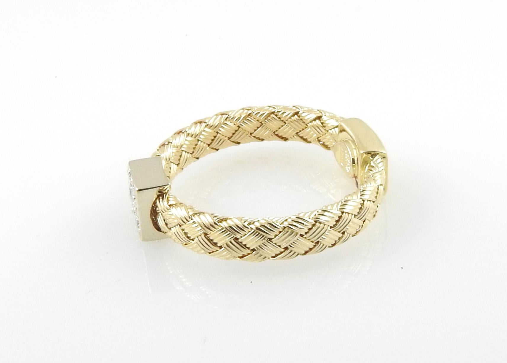 Roberto Coin 18K Yellow Gold Primavera Diamond Basket Weave Band 

Size 6.5

This beautiful cable band is set in yellow gold and has one square diamond station. 

The diamond station is set with 7 round brilliant diamonds of VS clarity and G