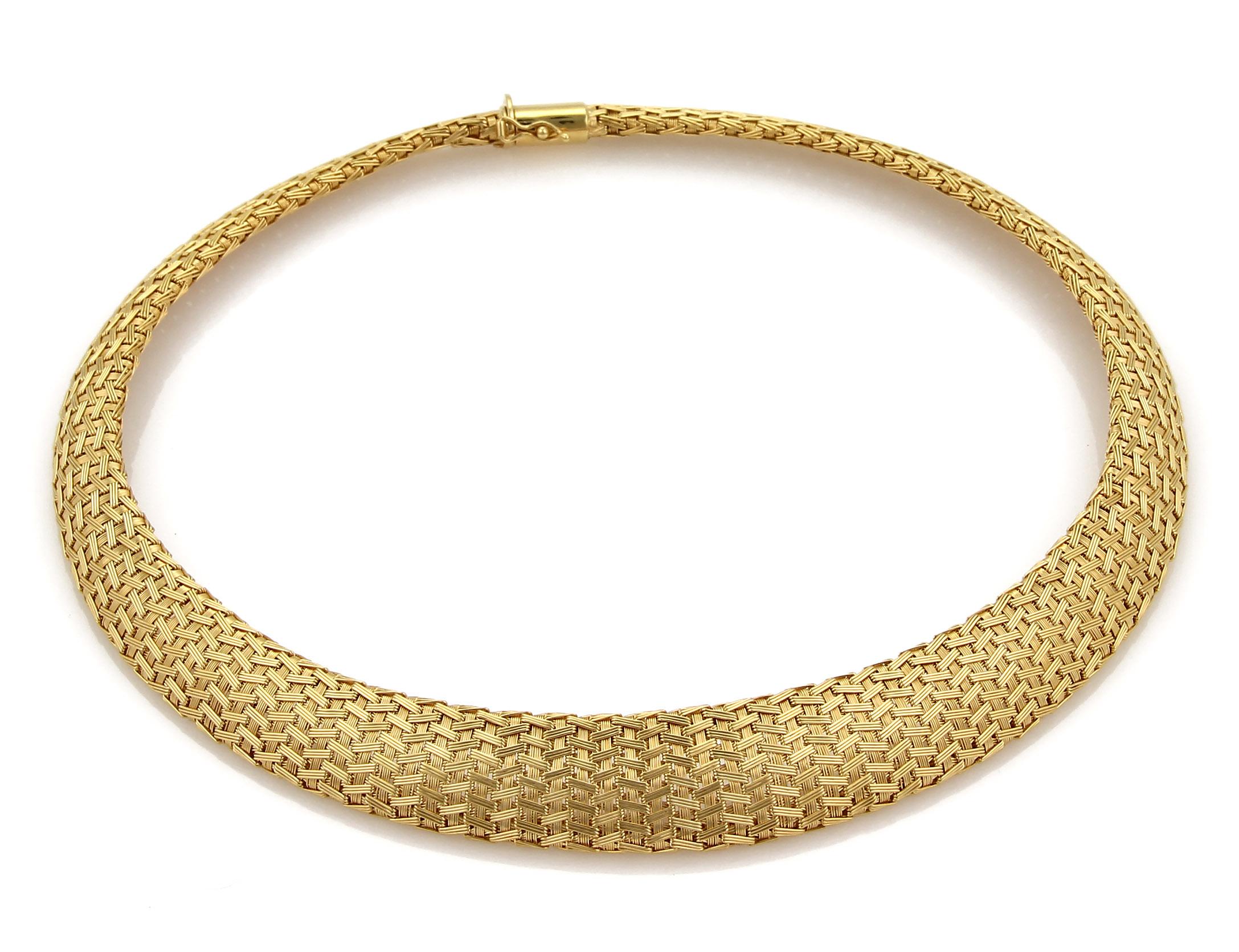 This is a gorgeous vintage collar necklace by Roberto Coin.  It is crafted from solid 18k yellow gold with a silk woven design in a graduated size, wide from the center and tapers off smaller at each end.  The semi dome form lay flat against your