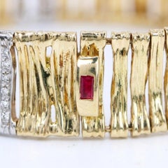 Bracciale Roberto Coin in oro giallo e bianco 18k con pavé di diamanti e motivo a pelle di elefante