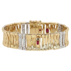 Bracciale Roberto Coin in oro giallo e bianco 18k con pavé di diamanti e motivo a pelle di elefante