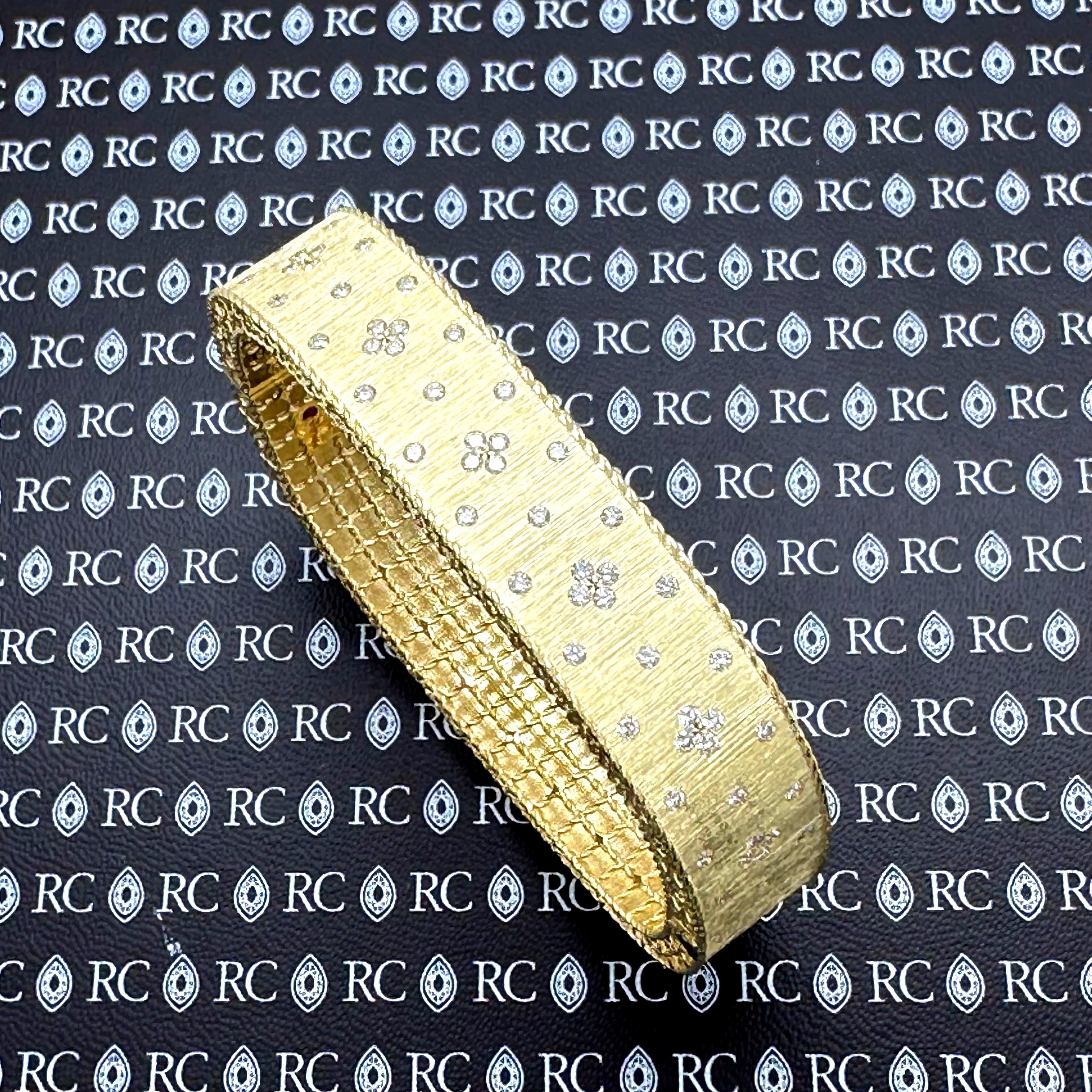 Roberto Coin Princess Satin Fluer De Lis Bangle
Style:   Bangle Bracelet
Ref. number:   7771195AYBAX
Metal:   18kt Yellow Gold 31.2 grams
Measurements:  6.5' Inches / 12 mm Wide
Main Stone:  64 Round Brilliant Diamonds. ~0.87 tcw
Hallmark:  RC