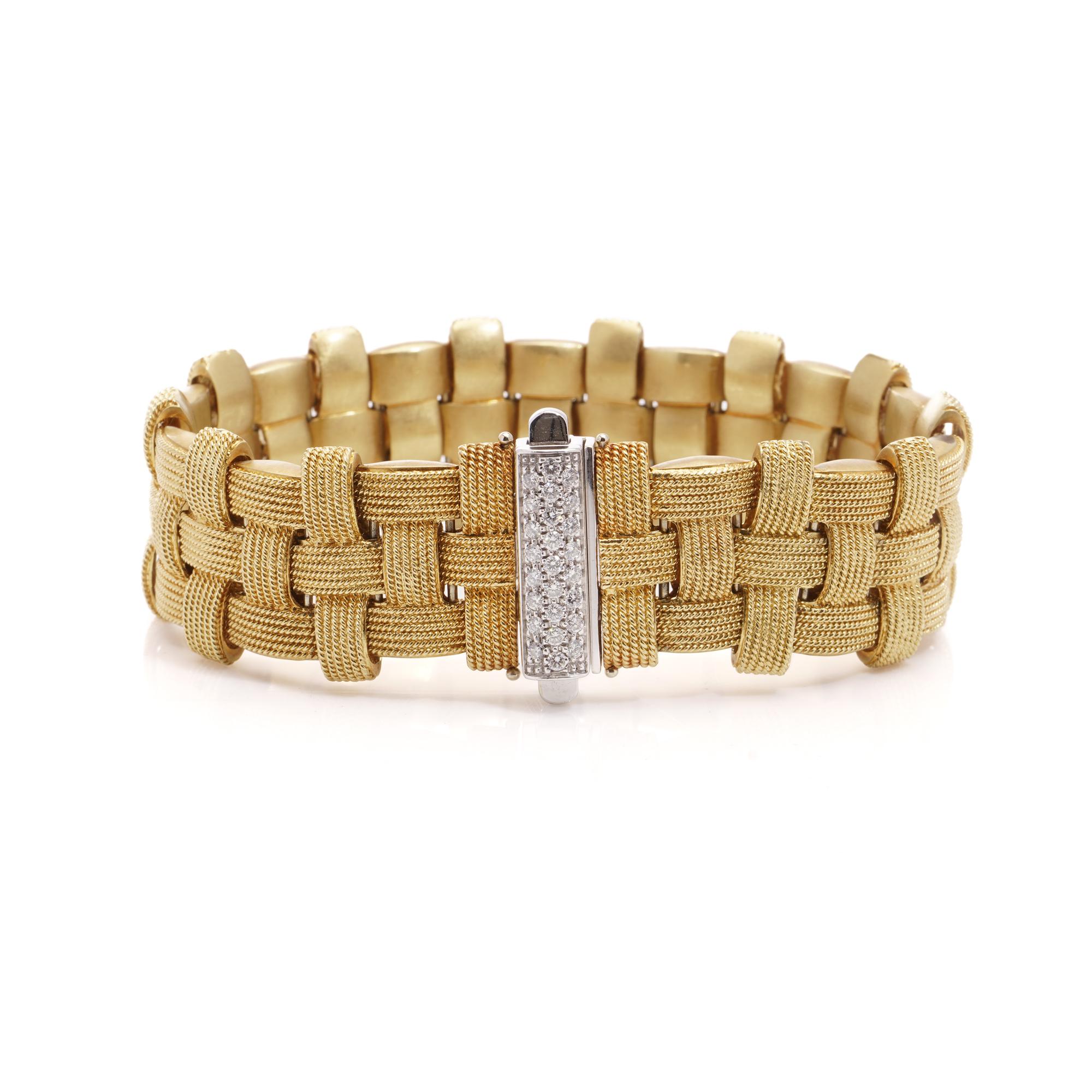 Introducing the epitome of luxury and sophistication, the Roberto Coin 18kt White and Yellow Gold Appasionata Woven Design Bracelet crafted by the renowned Italian jeweller Roberto Coin. 

Imported to England, Birmingham, in 2002, this bracelet