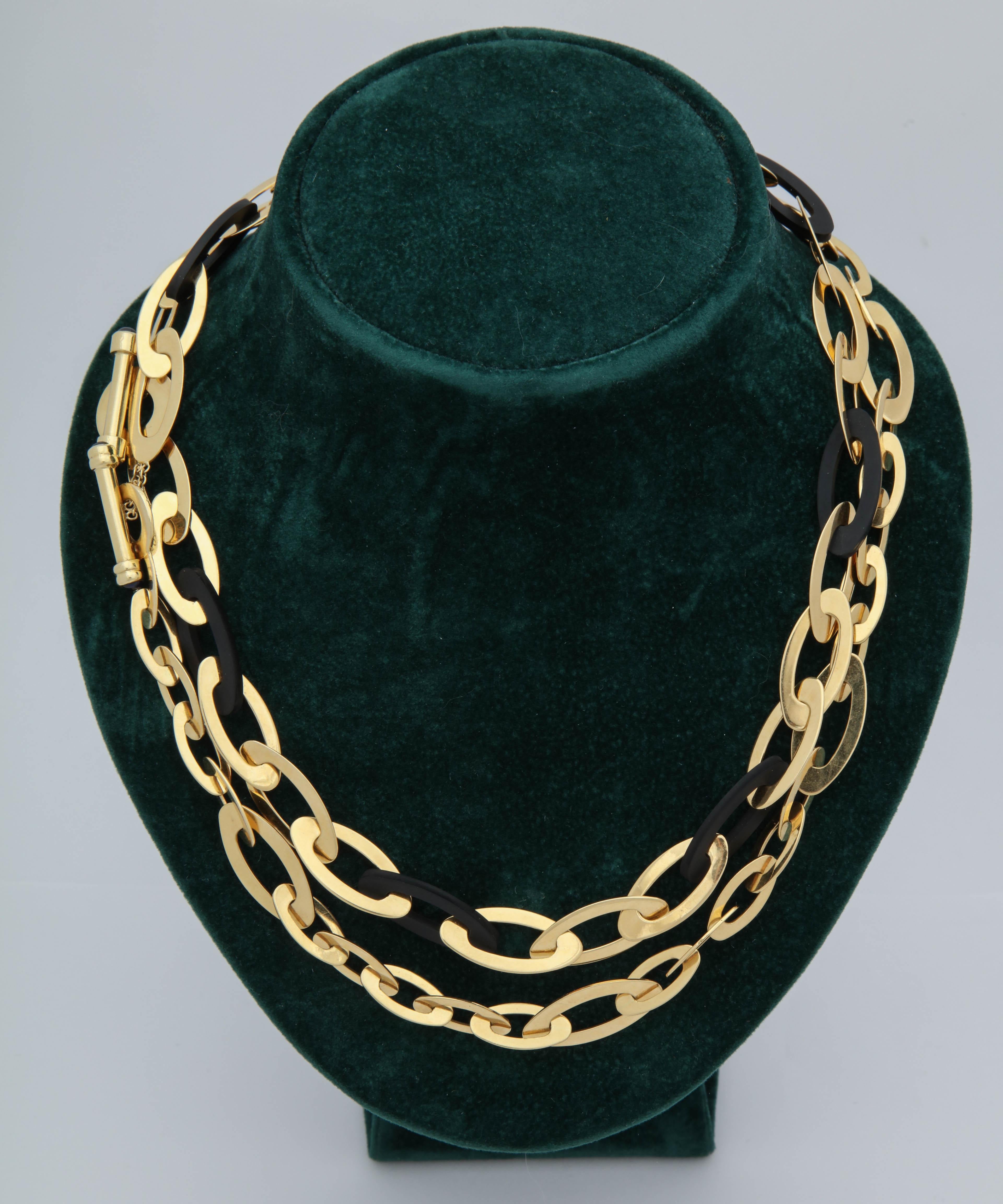 One 18kt Yellow Gold Chain Link Necklace Composed Of High Quality Double Reinforced Oblong Jewelers Rubber Pieces And Further Designed With Numerous 18kt Yellow Gold Oblong Shaped Links. This Long Chain May Be Converted To Be Worn As Two Separate
