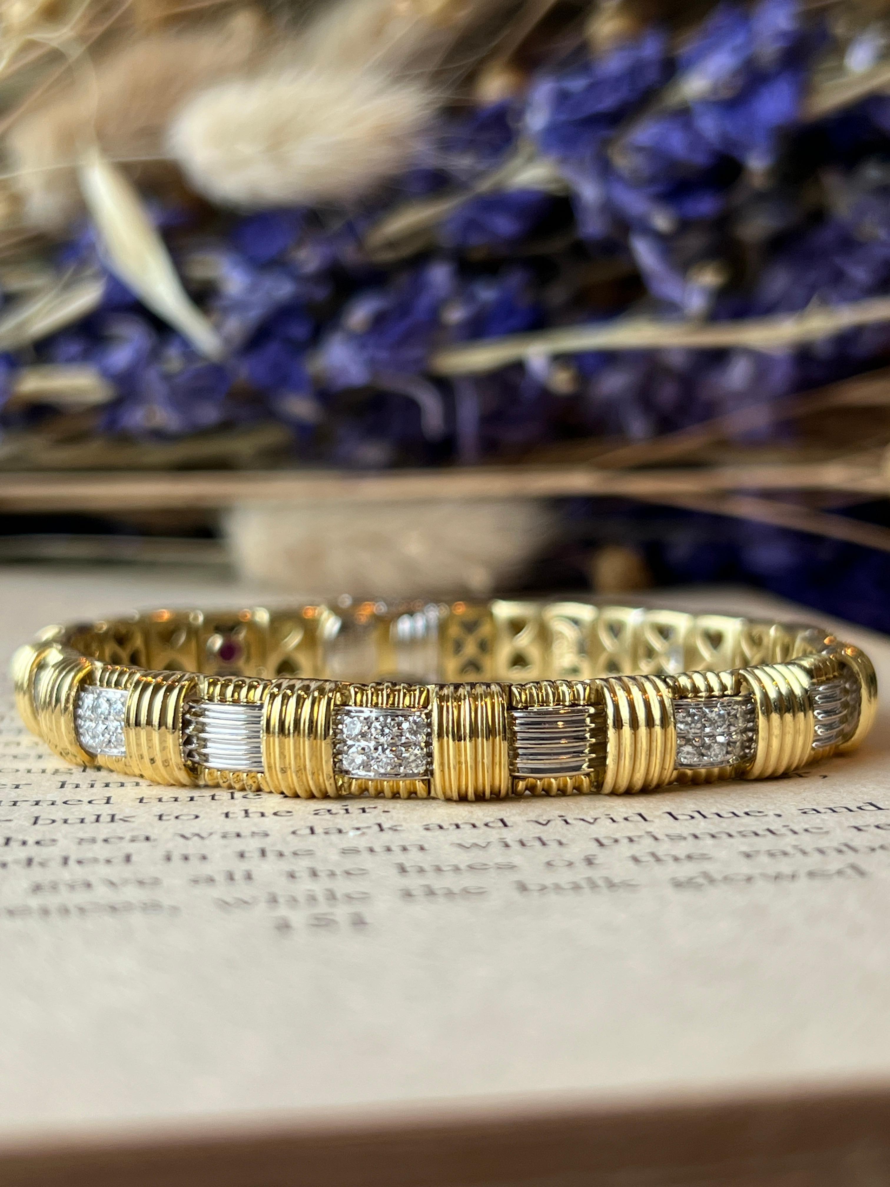 Discover timeless elegance with this 18 karat yellow and white gold Appassionata bracelet by Roberto Coin. Featuring sixty four, 
 approximately 1.43 carats, of dazzling round brilliant diamonds, with G/H color and SI1 clarity, ensuring exceptional