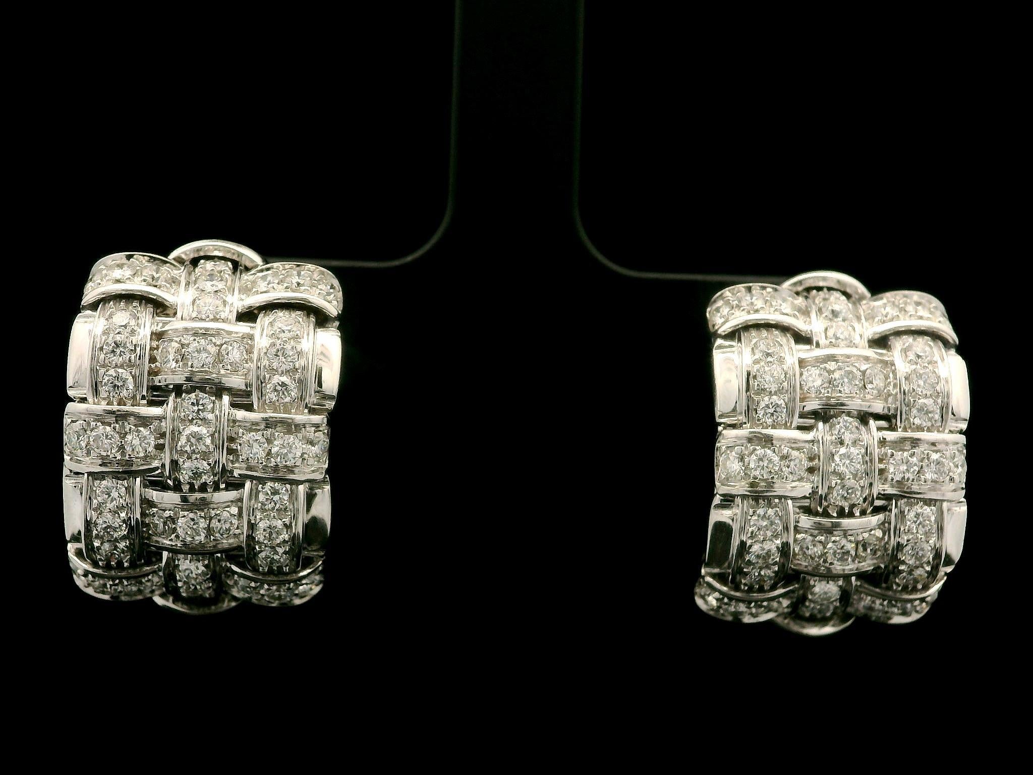 --Stone(s):--
(2) Red Stones - Marquise Cut - Bezel Set - Red Color - On Backs - For Signature
(90) Natural Genuine Diamonds - Round Brilliant Cut - Pave Set - F/G Color - VS1/VS2 Clarity - 1.50ctw (approx.)

Material: Solid 18k White Gold 
Weight: