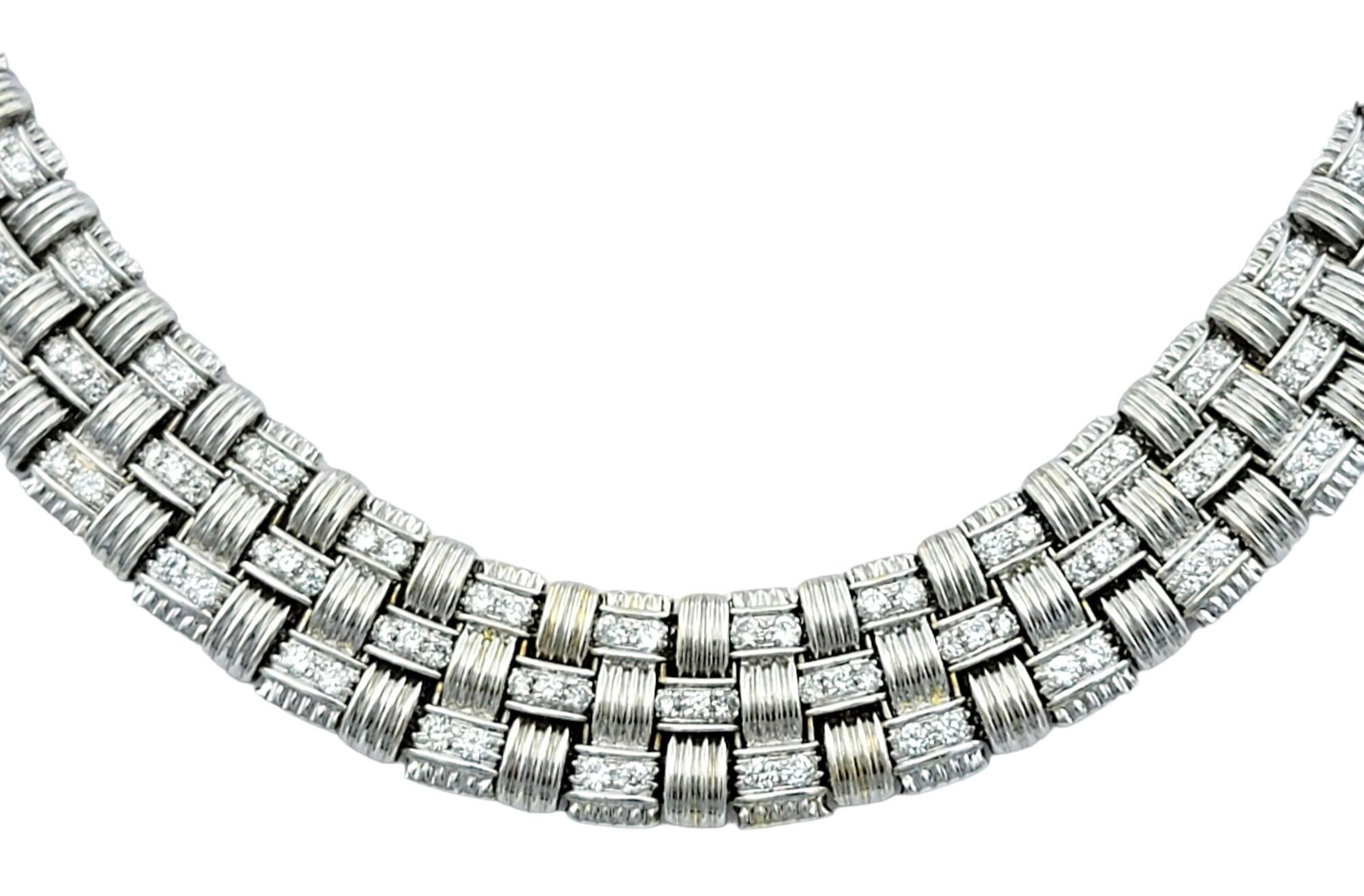This gorgeous Roberto Coin Appassionata diamond collar necklace exudes timeless elegance with its intricate woven design. Crafted in luxurious 18 karat white gold, this necklace is a stunning piece of craftsmanship.

The delicate detail of the woven