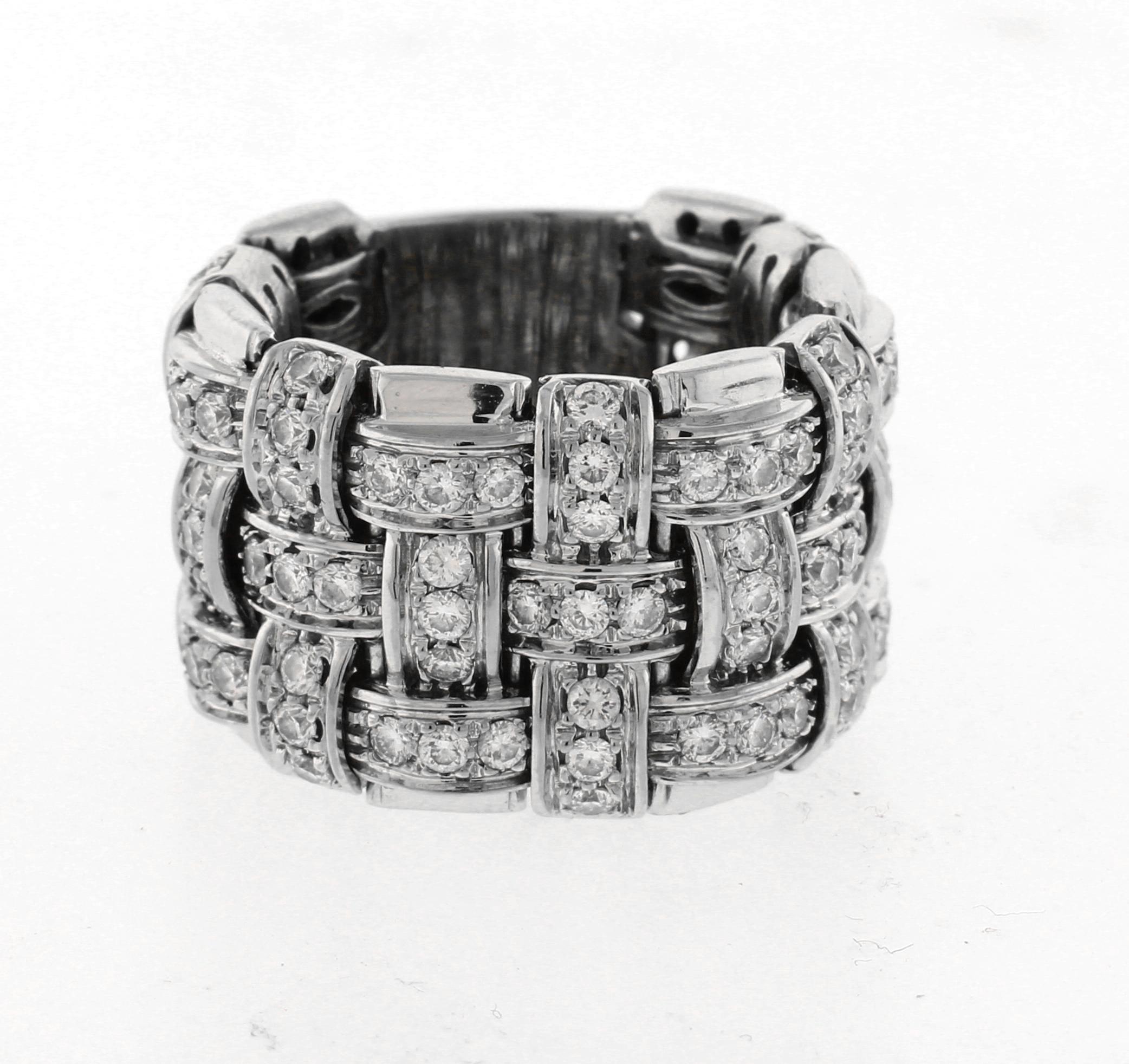 From Robert Coin, this ring is from the Appassionata collection.  The ring features 99 round brilliant cut diamonds approximately 1.75 carat. 
♦ Designer: Roberto Coin
♦ Metal: 18kt White gold
♦ Size: 4 1/4, can be resized slightly
♦ Gemstone: