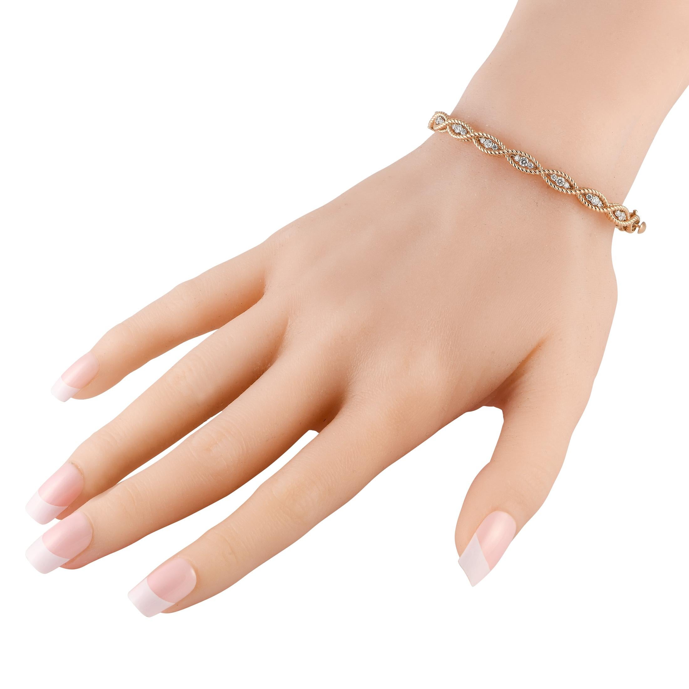 Bring chic elegance to your daily wear or special occasion outfit with this Roberto Coin bracelet. This meticulously detailed bangle features a braided design forming marquise-shaped links punctuated inside with a trio of diamonds. This creation is