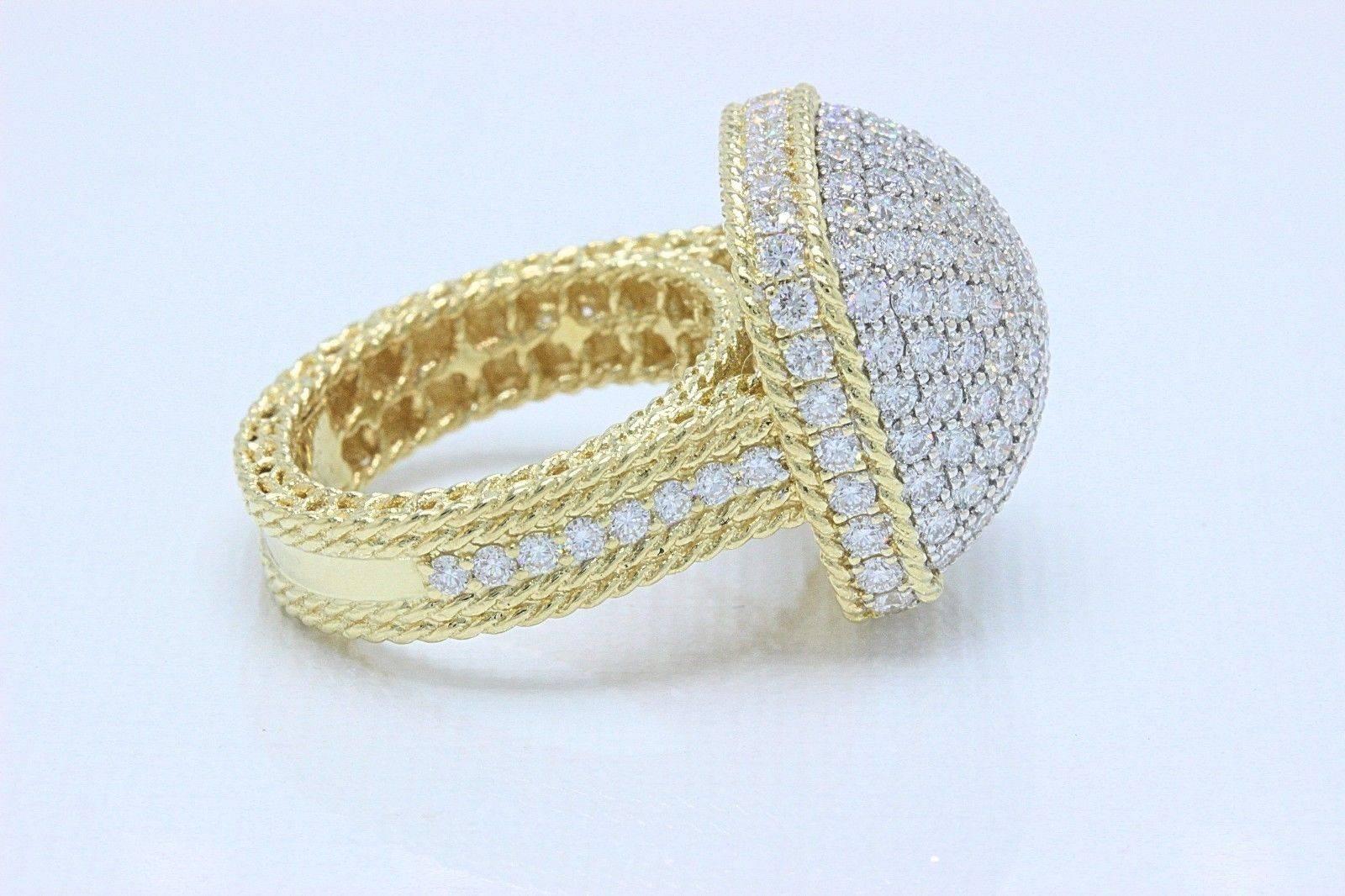 ROBERTO COIN
Style:  Barocco Collection Diamond Dome Ring
Metal:  Twisted 18KT Yellow Gold
Size:  6.5 - Sizable
Width:  Dome is 18 MM X 18 MM X 9 MM - Band is 5 MM 
Total Carat Weight:  3.30 TCW  Pave White Diamonds Dome & Trim at Shoulders
Diamond