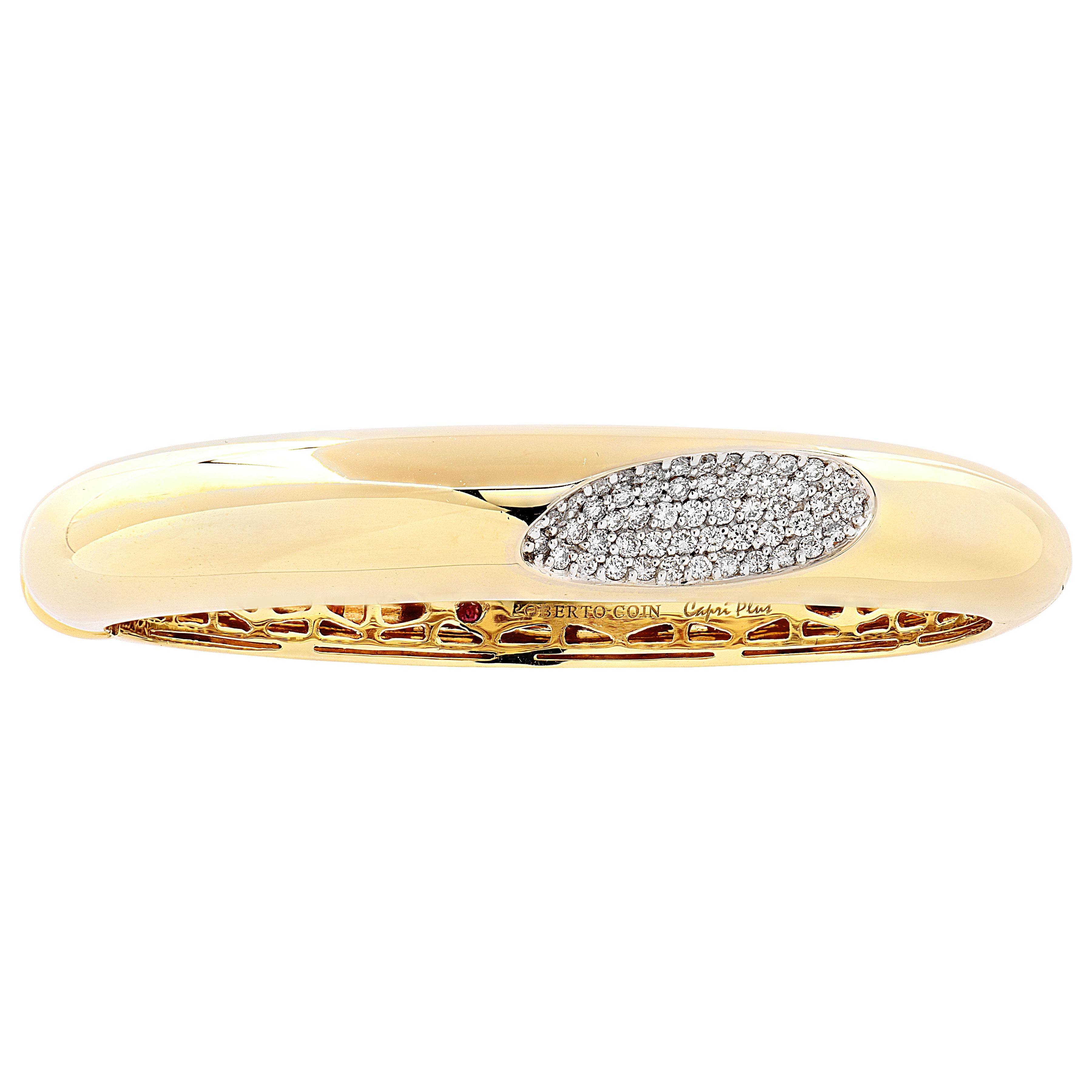 Gracefully crafted in Italy by the chic and celebrated designer Roberto Coin, this elegant bangle hails from the iconic Capri Plus collection—a tribute to refined glamour with a touch of Mediterranean flair. Rendered in luminous 18k yellow gold, the