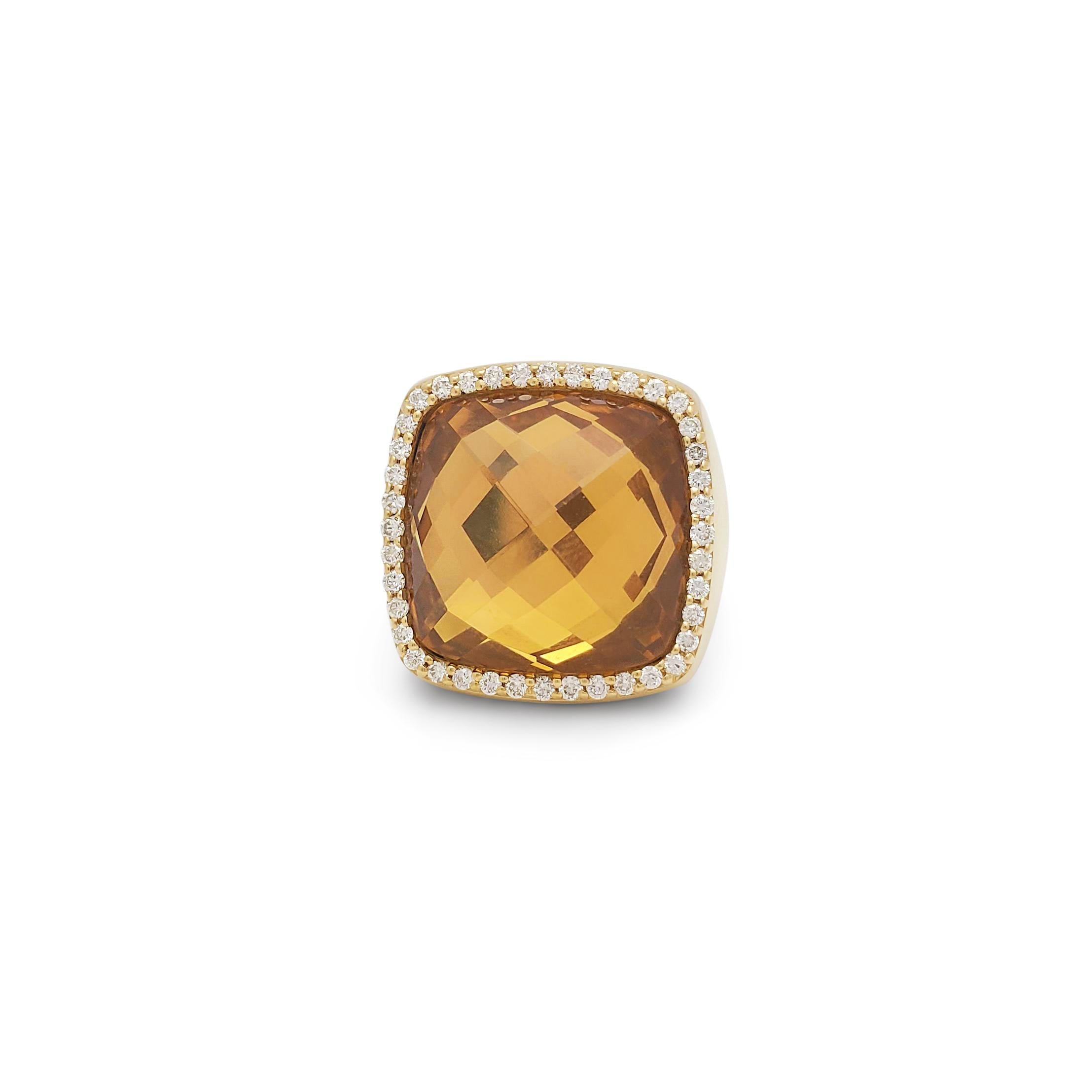 Authentic Roberto Coin cocktail ring crafted in 18 karat yellow gold.  The ring centers on a cushion cut citrine of approximately 8 carats that is framed by round cut diamonds weighing an estimated .40 carats total.  Size 6 1/2.  Signed Roberto