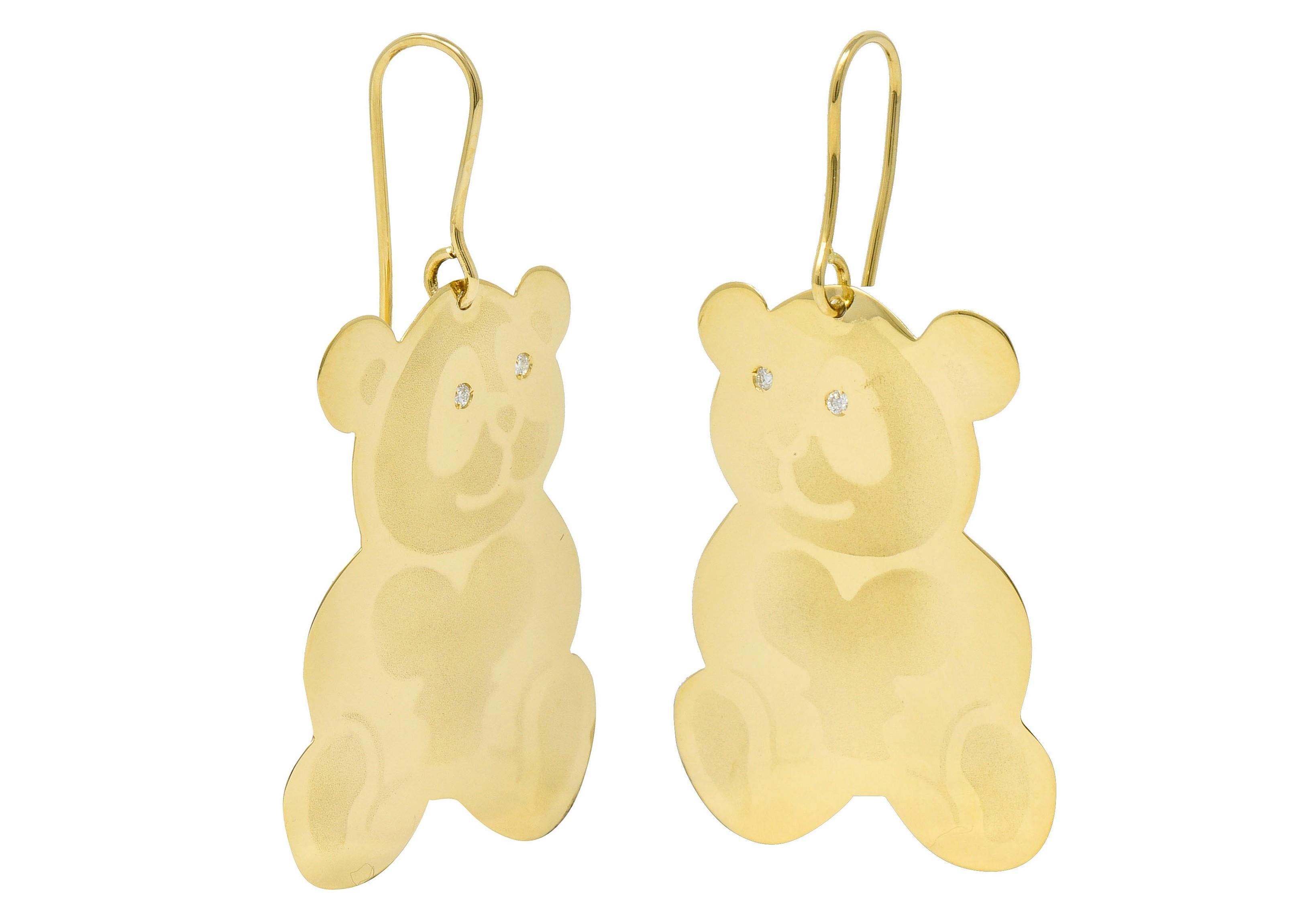 French hook earrings suspend large bear shaped drops

Lightly etched to depict a seated panda with a heart shaped stomach pattern

With flush set round brilliant cut diamond eyes

Eye-clean and white while weighing in total approximately 0.04