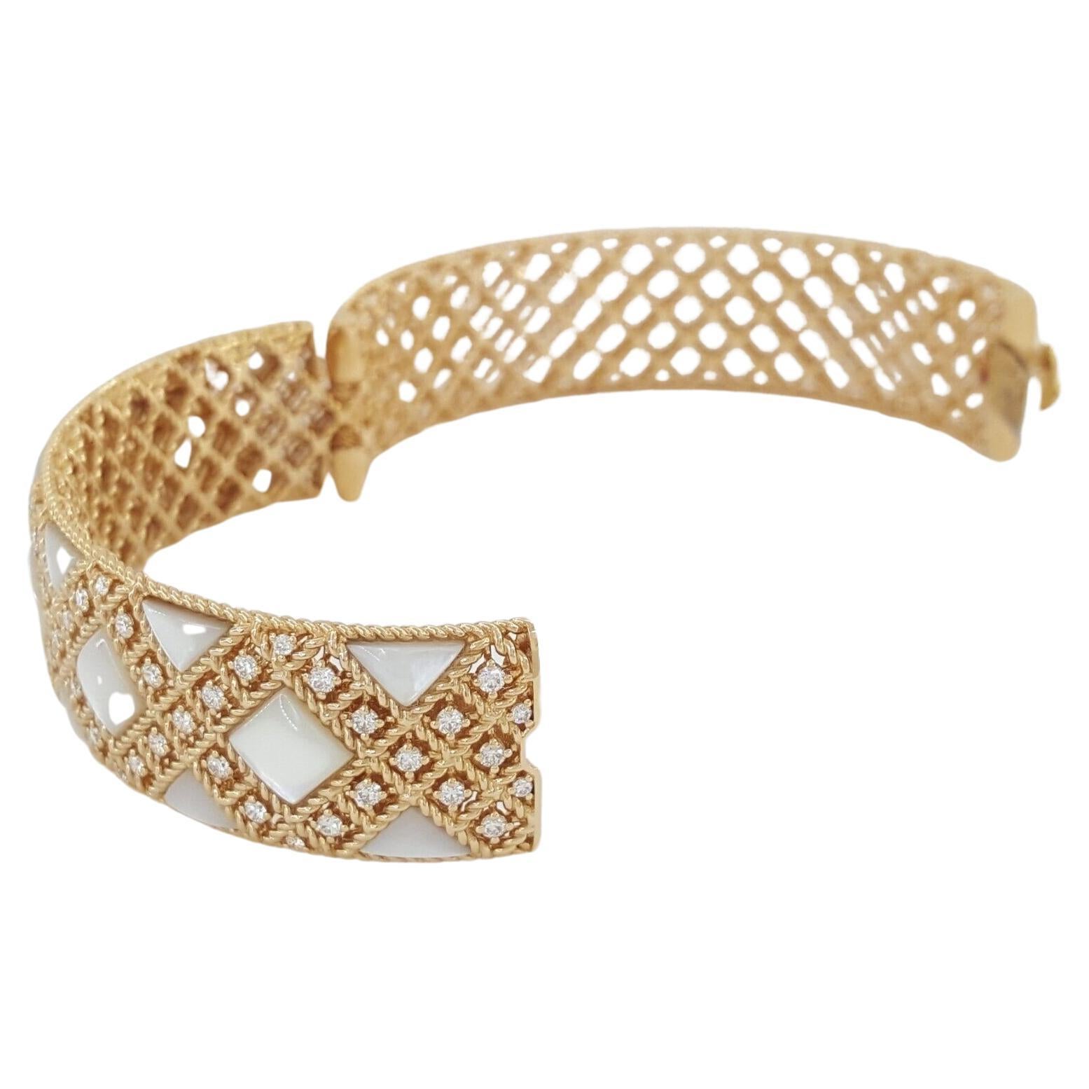 Roberto Coin Palazzo Ducale MoP 1.24 ct Diamond 18K Rose Gold Bangle Bracelet. 

The bracelet weighs 43.9 grams, 6.25 inches (small size, fits a small to medium wrist), contains 67 Natural Round Brilliant Cut Diamonds weighing approximately 1.24 ct,