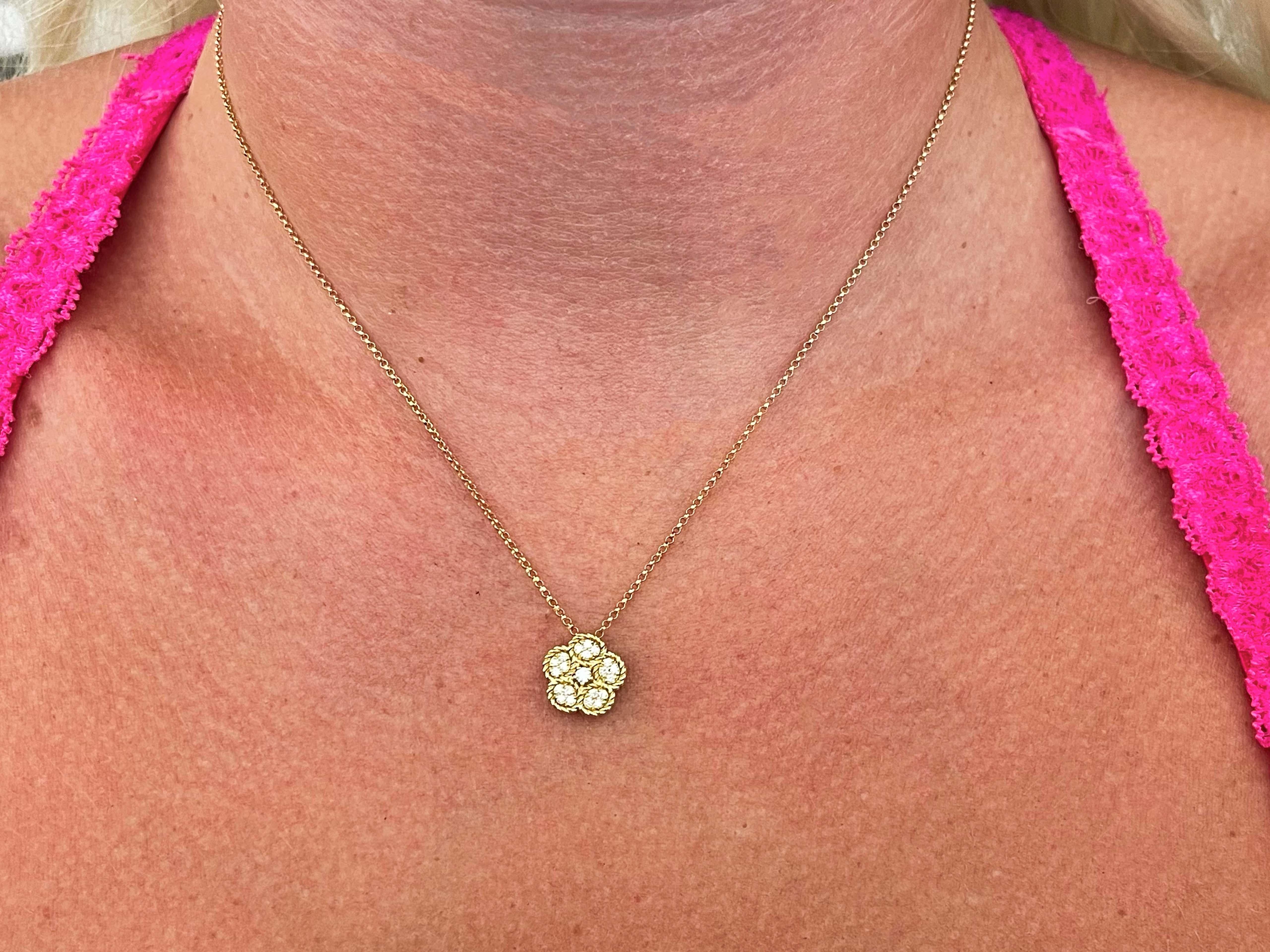 Item Specifications:
​
​Designer: Roberto Coin

Necklace Metal: 18k Yellow Gold

Total Weight: 4.8 Grams

Diamond Color: G

Diamond Clarity: VS

Diamond Carat Weight: 0.18

Diamond Count: 21 round brilliant cut

Chain Length: 16